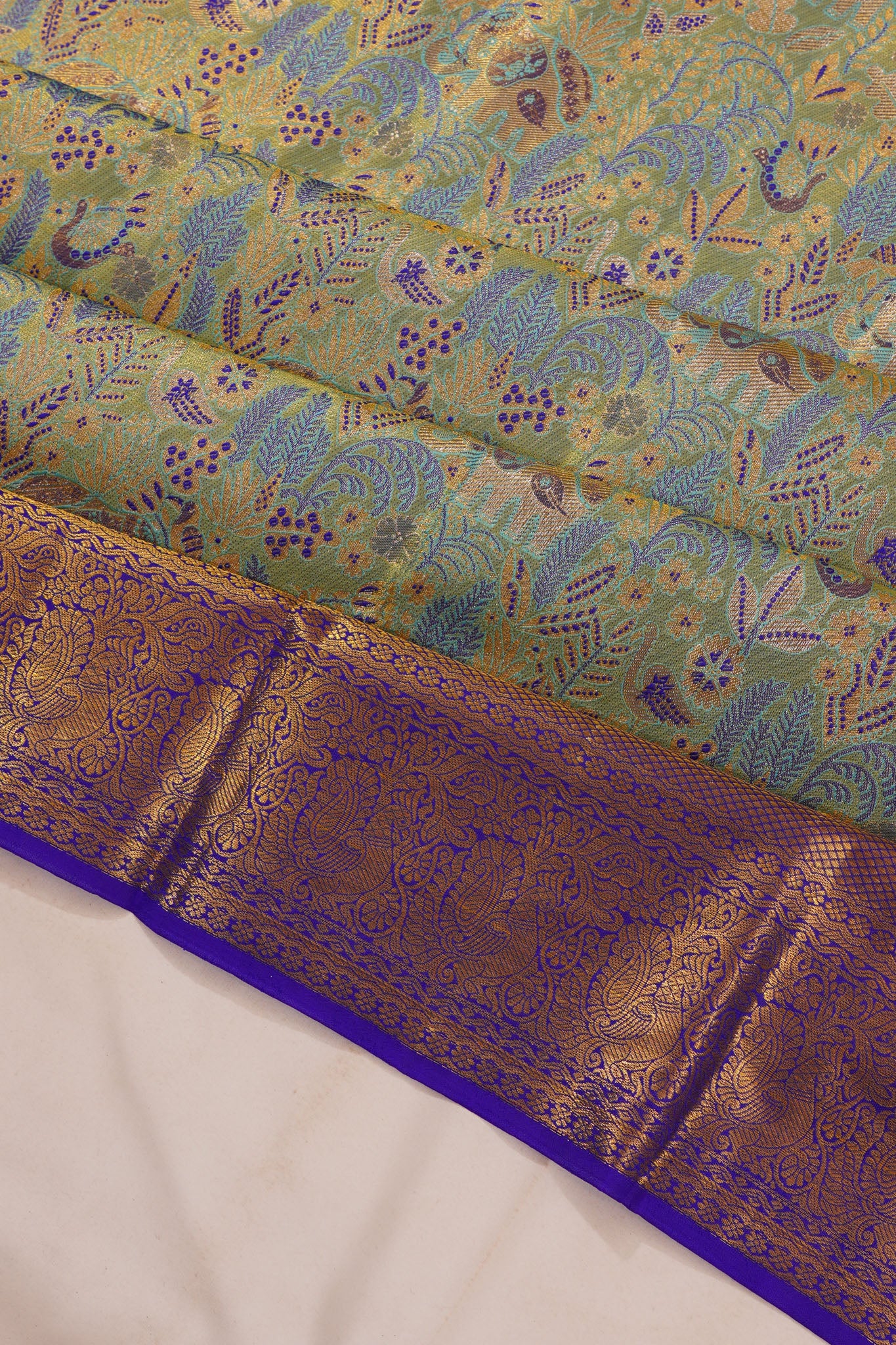 Taranga Kanchi Silk Tissue Brocade Green Saree
