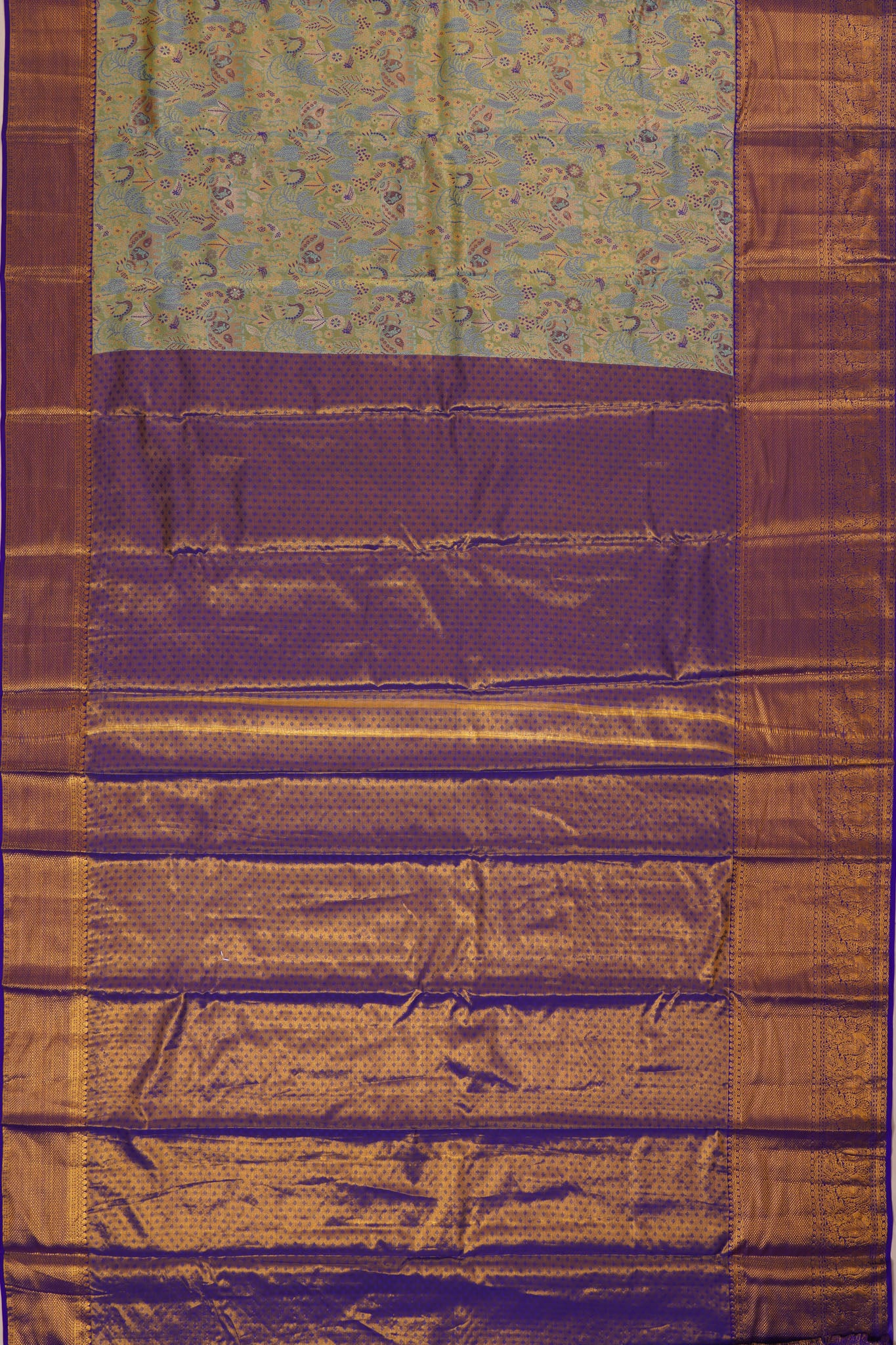 Taranga Kanchi Silk Tissue Brocade Green Saree