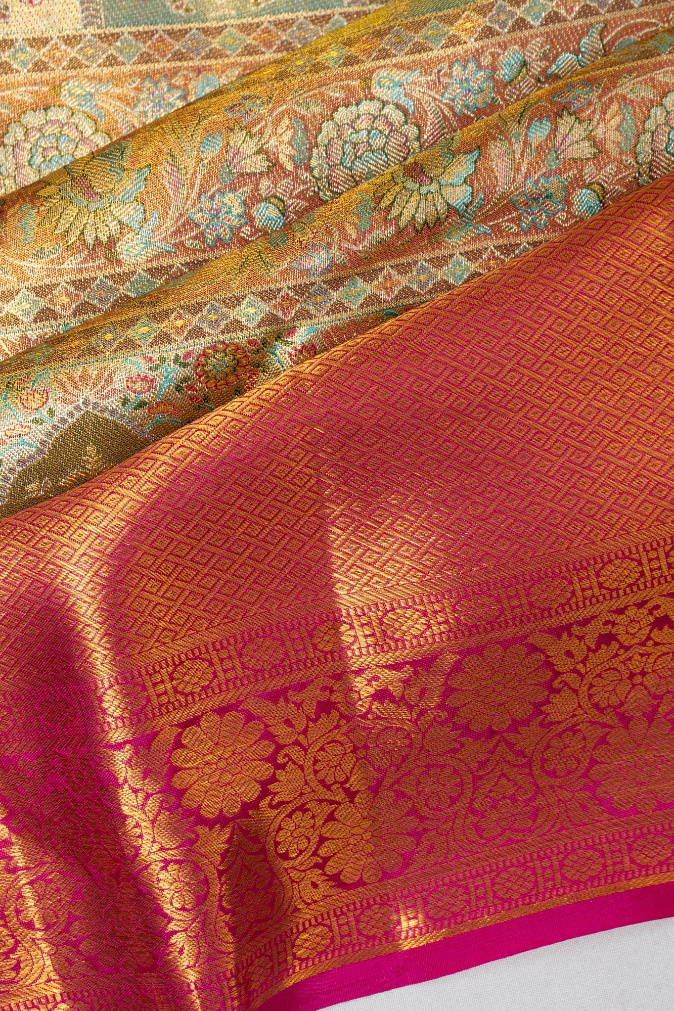 Taranga Kanchi Silk Tissue Brocade Green Saree