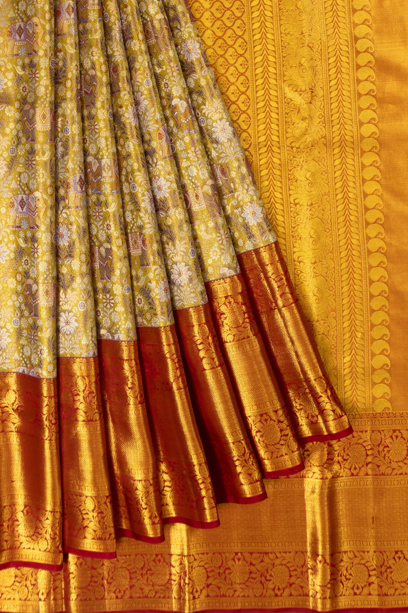 Taranga Kanchi Silk Tissue Brocade Gold Saree