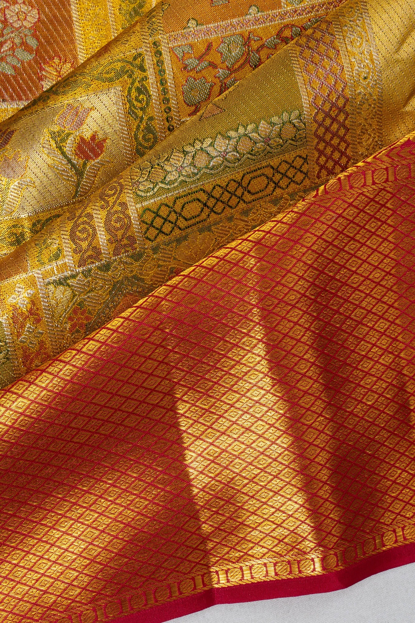 Taranga Kanchi Silk Tissue Brocade Green Saree