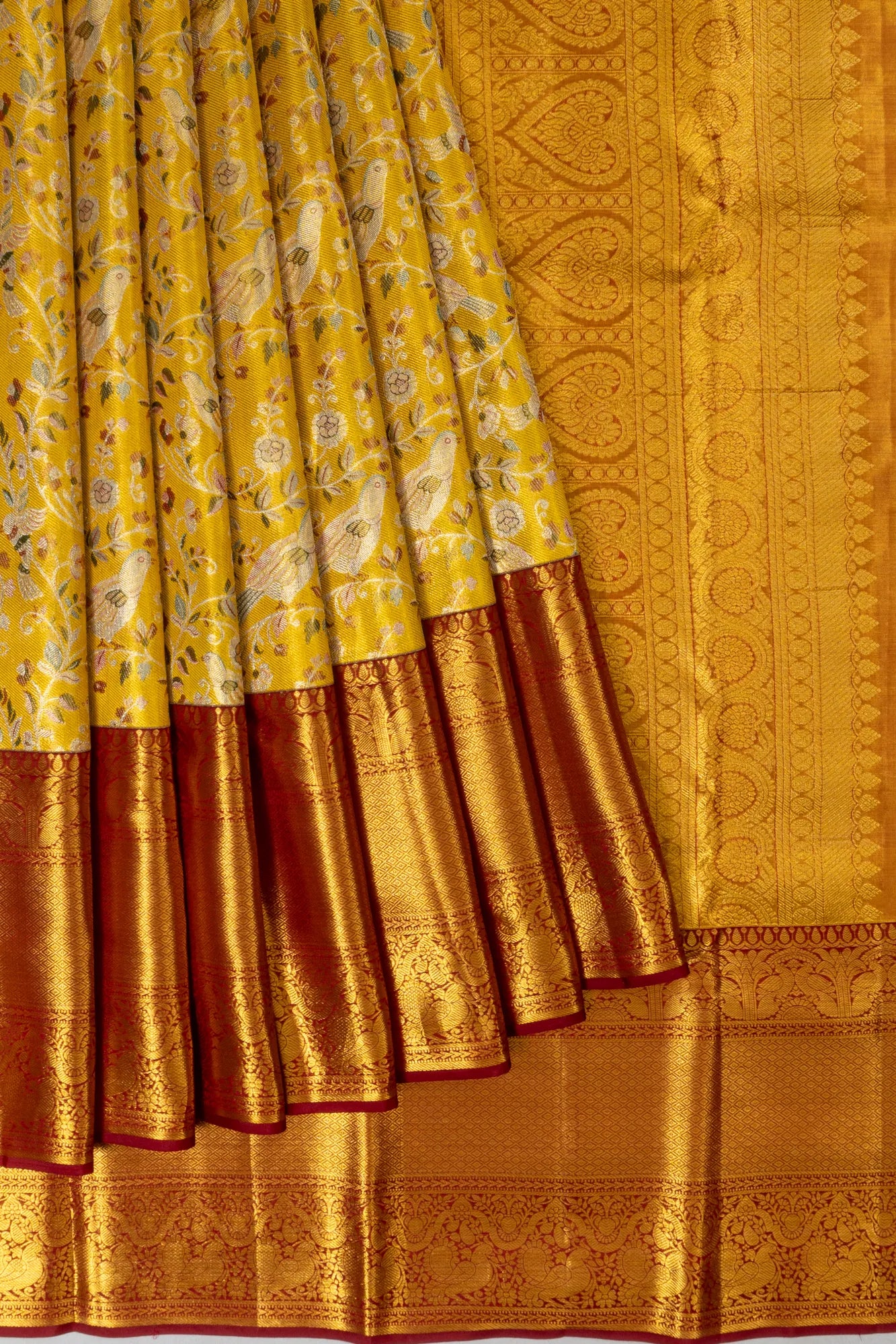 Taranga Kanchi Silk Tissue Brocade Gold Saree