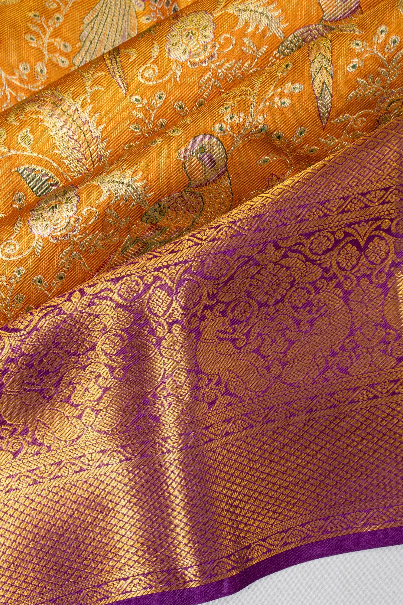 Taranga Kanchi Silk Tissue Brocade Orange Saree