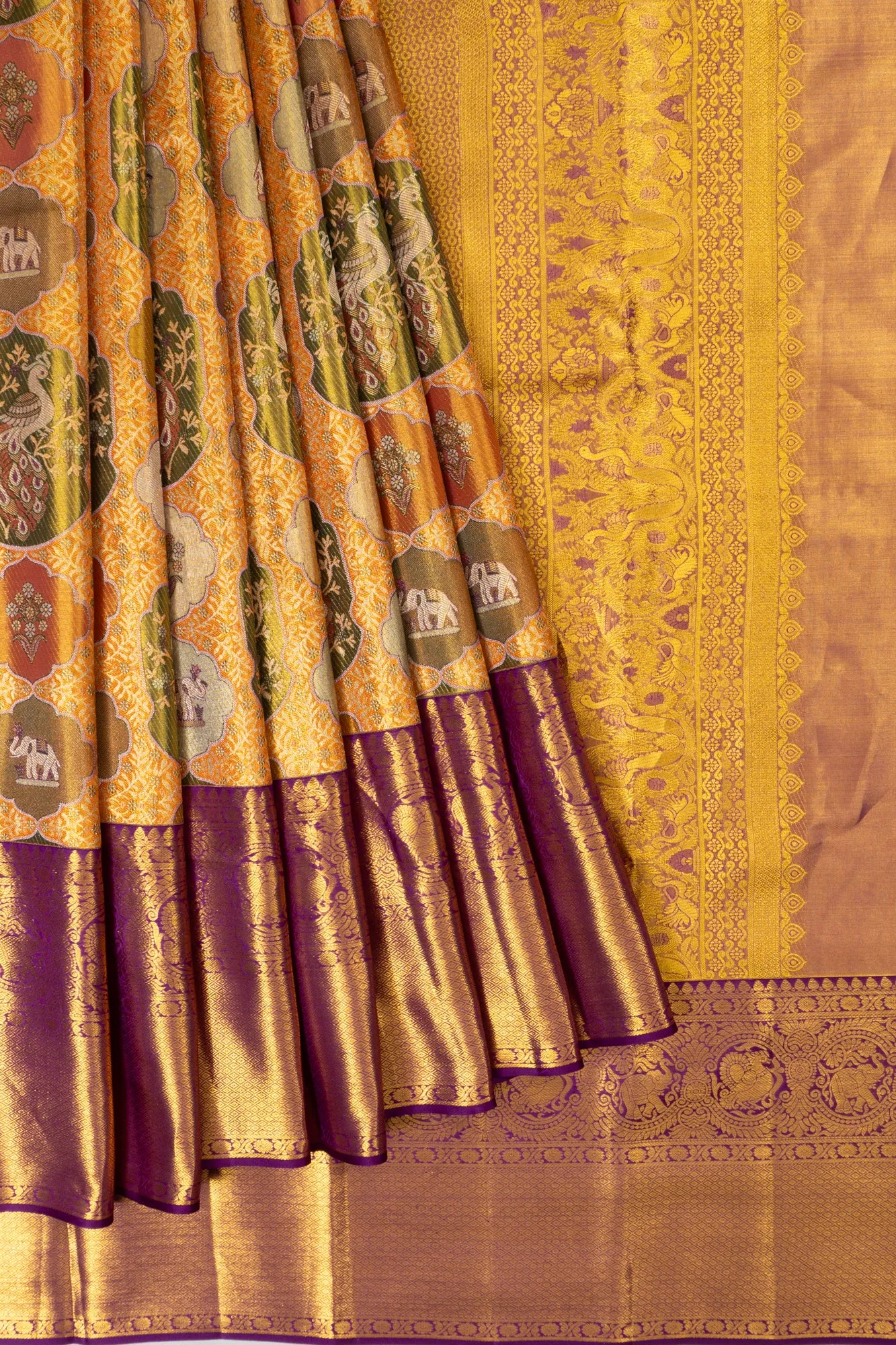 Taranga Kanchi Silk Tissue Brocade Gold Saree