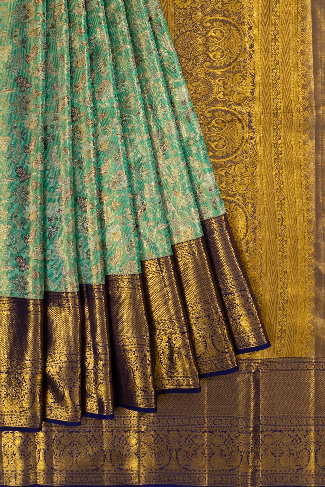 Taranga Kanchi Silk Tissue Brocade Green Saree