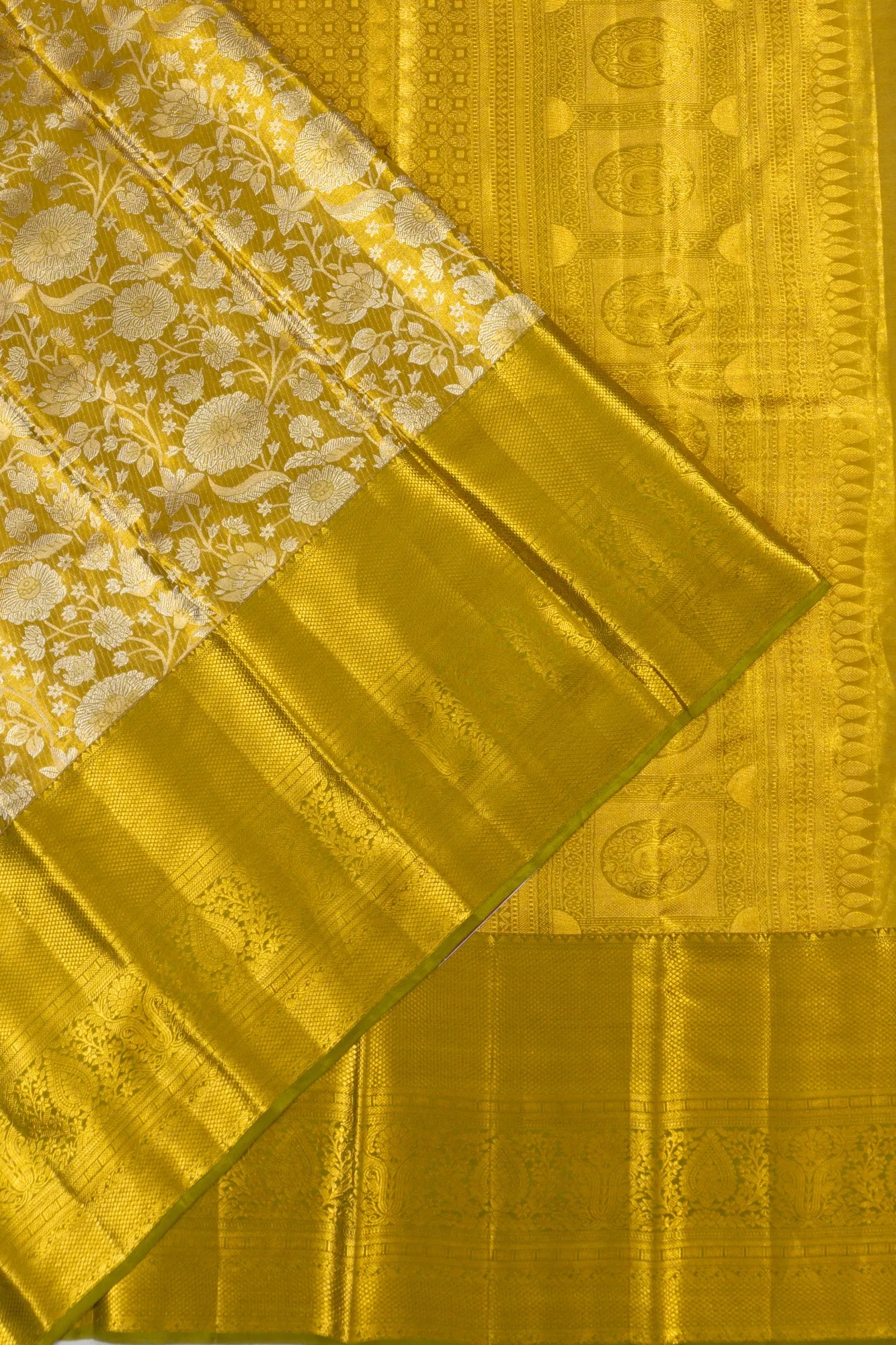 Taranga Kanchi Silk Tissue Brocade Green Saree