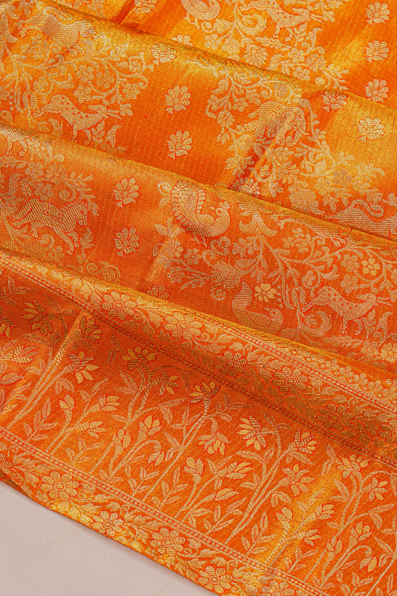Taranga Kanchi Silk Tissue Brocade Orange Saree