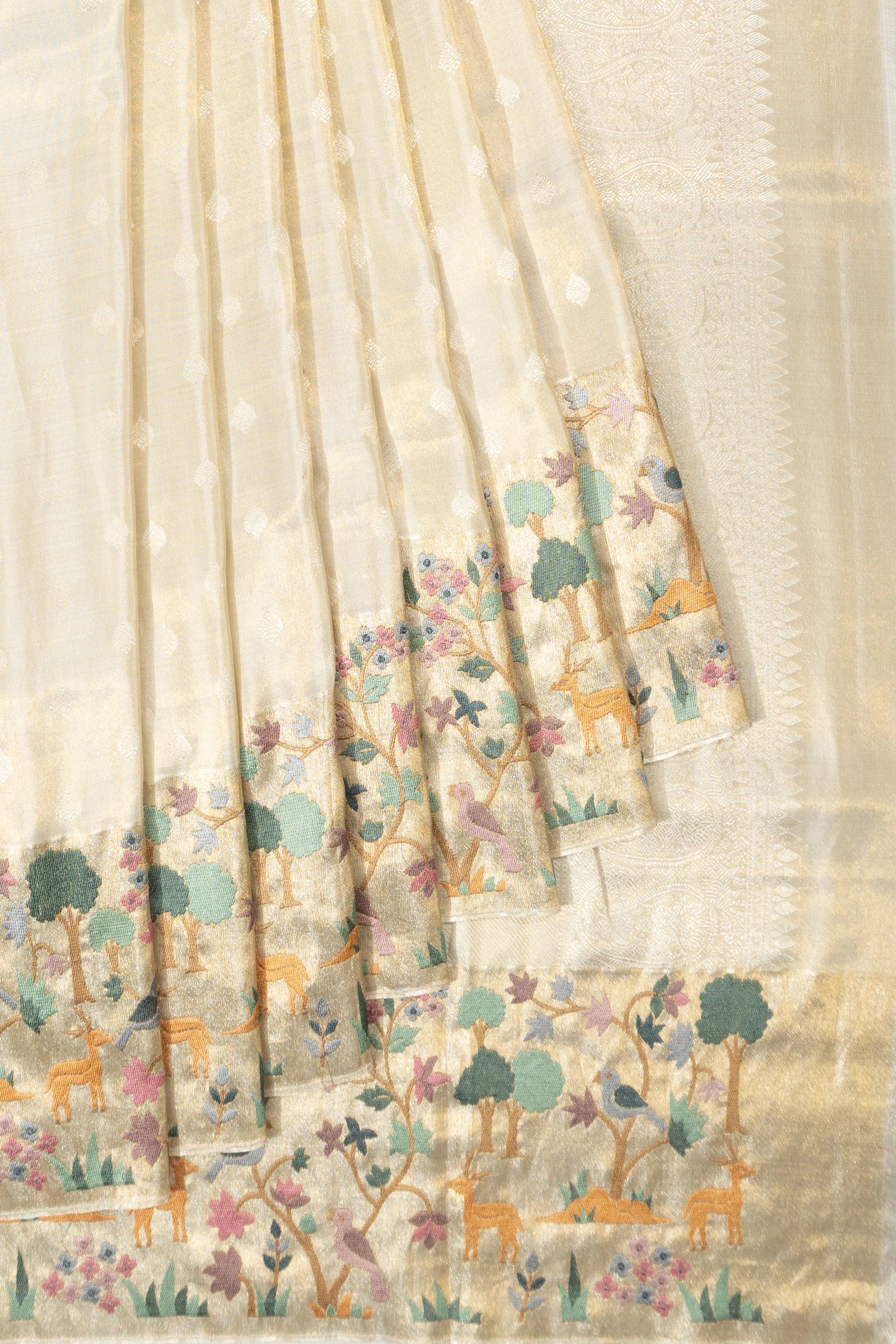 Kanchipuram Silk Tissue Butta Off White Saree With Embroidery Border