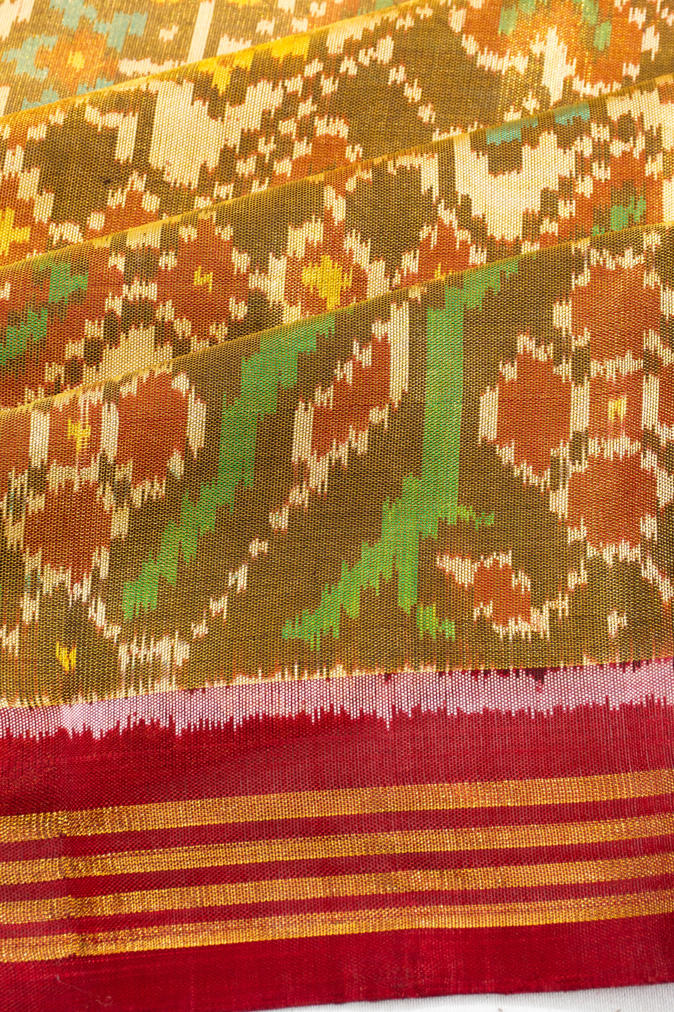 Semi Patan Silk Ikat Tissue Green Saree