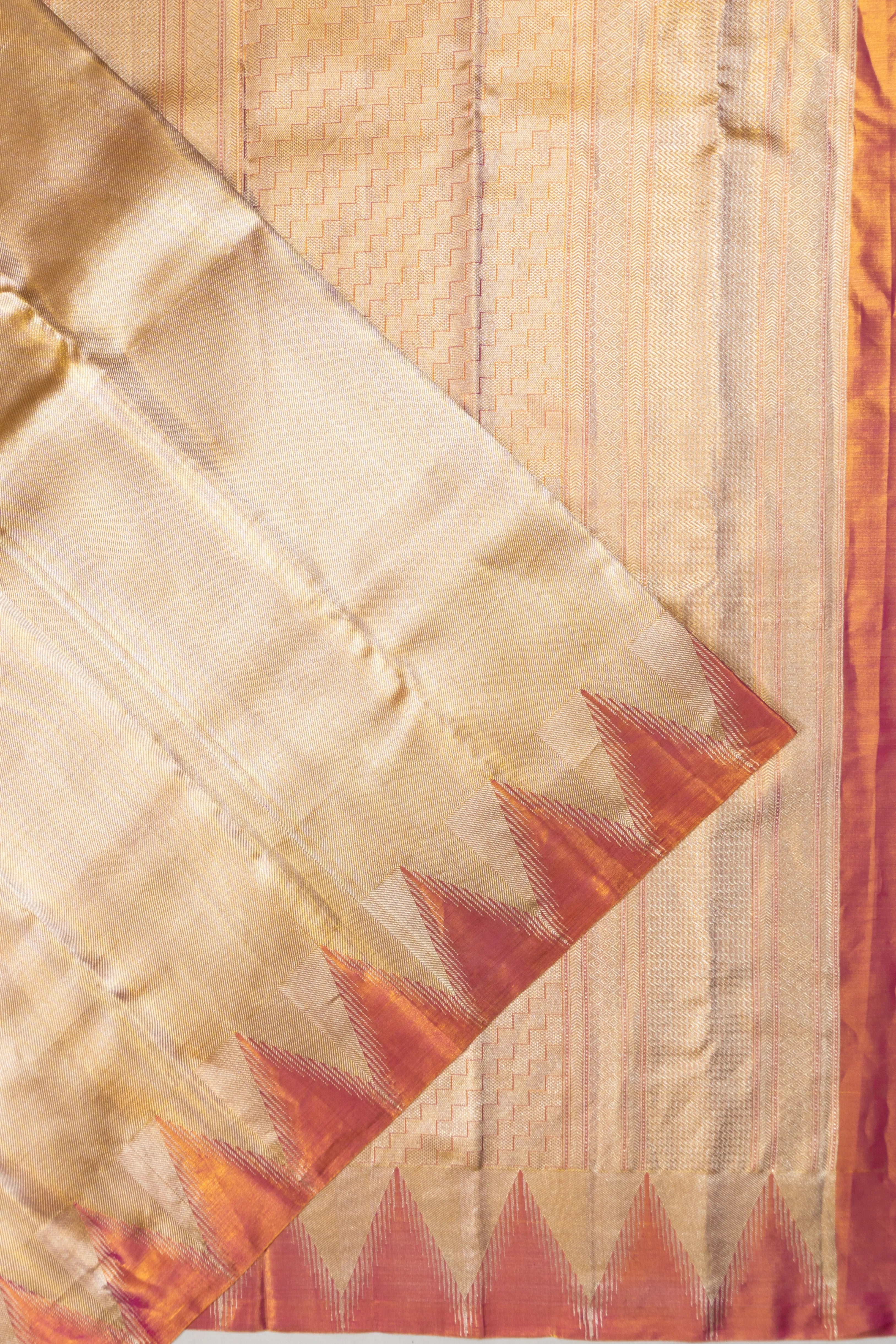 Taranga Kanchi Silk Tissue Brocade Gold Saree