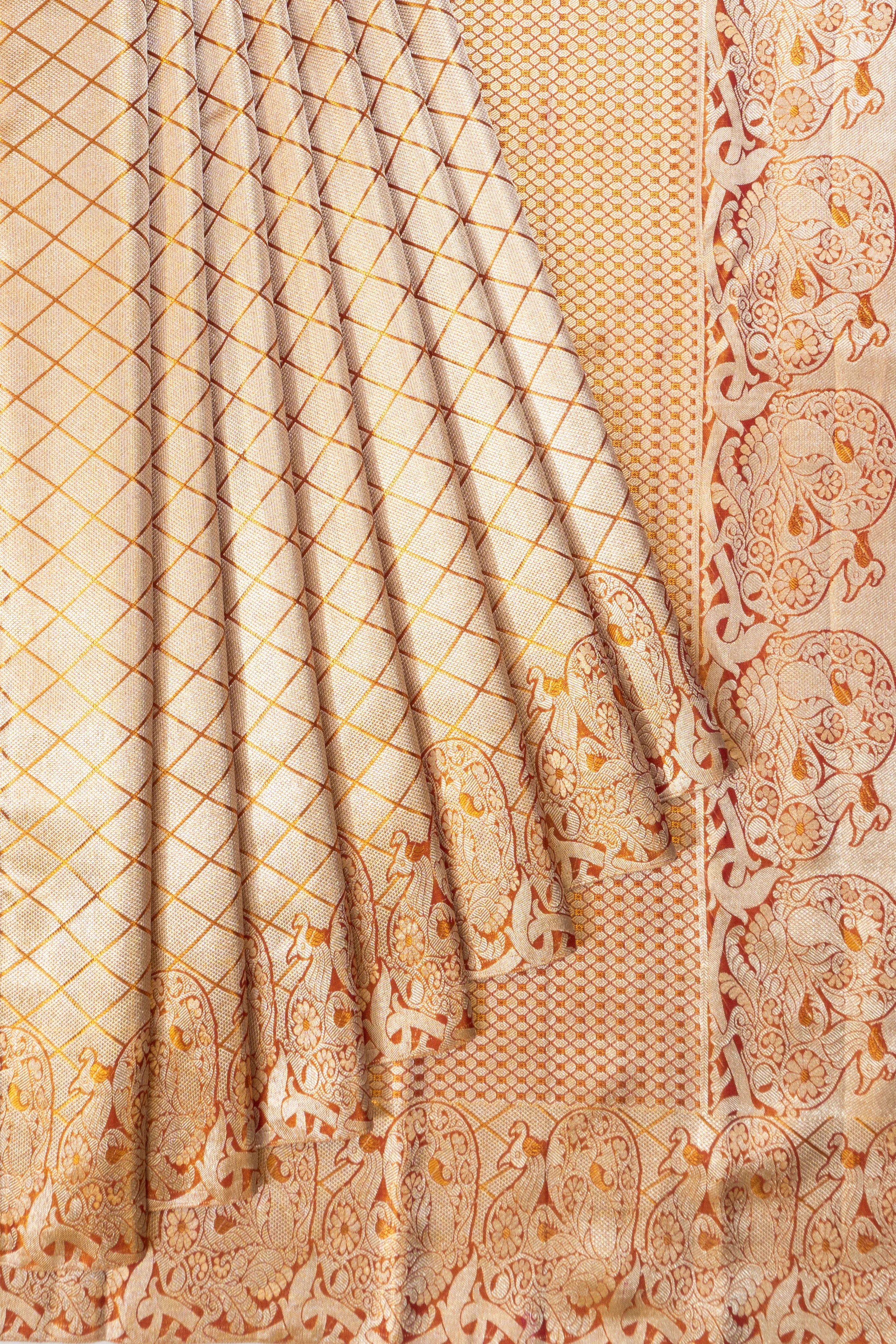 Taranga Kanchi Silk Tissue Brocade Gold Saree