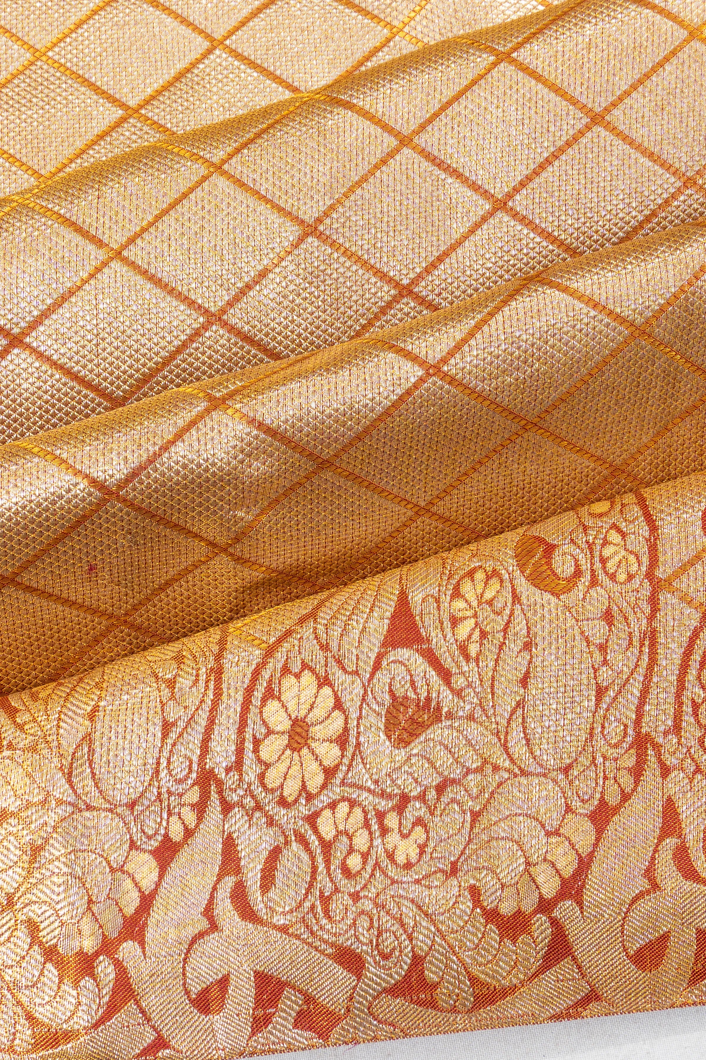 Taranga Kanchi Silk Tissue Brocade Gold Saree