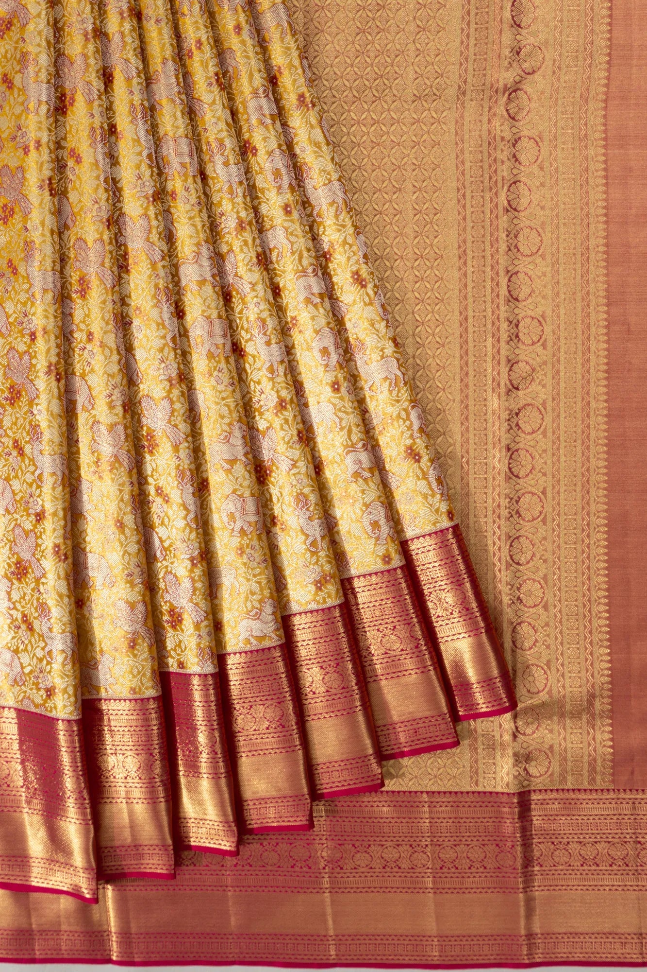 Taranga Kanchi Silk Tissue Brocade Gold Saree