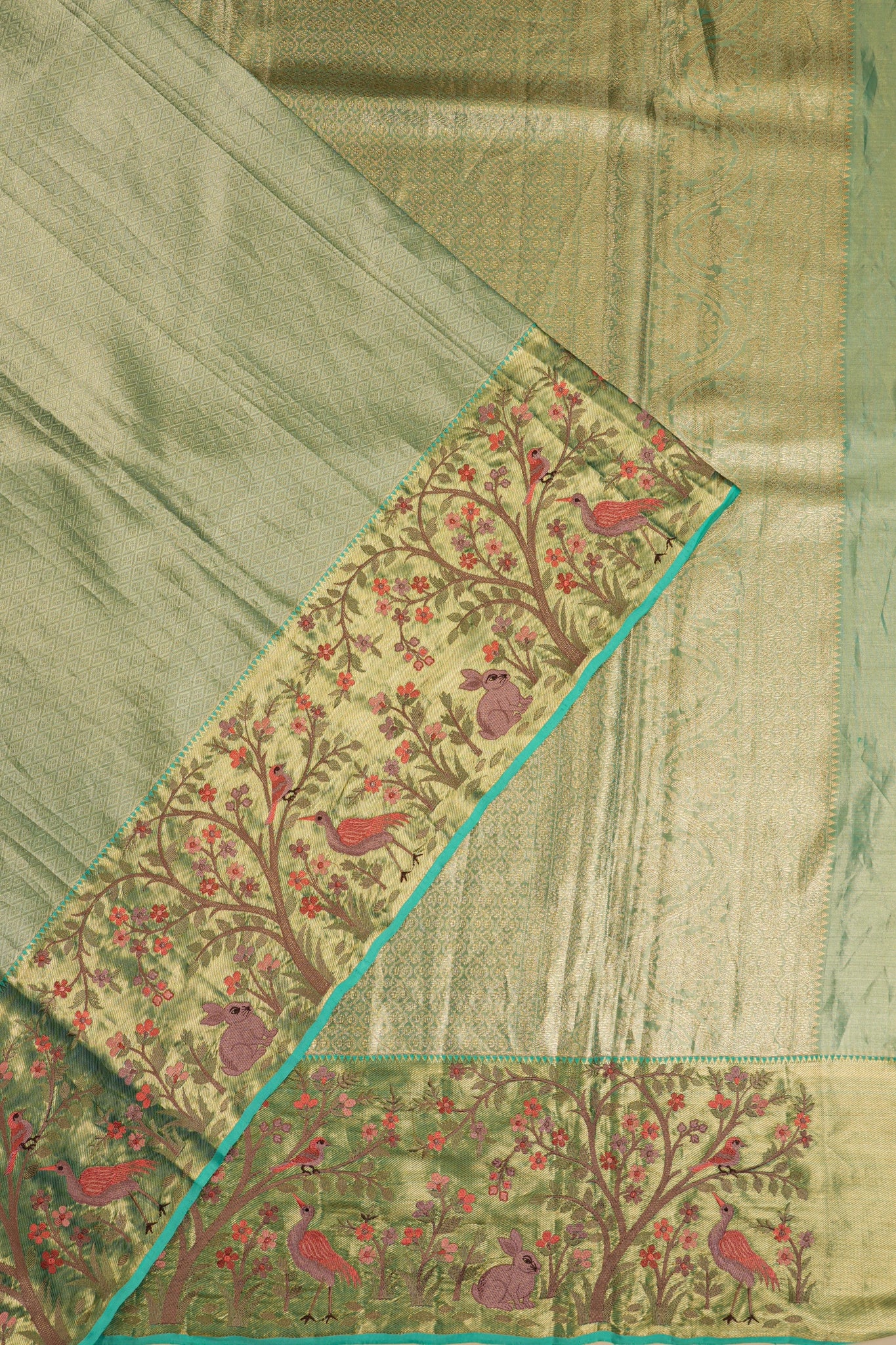 Soft Silk Tissue Brocade Green Saree With Embroidery Border