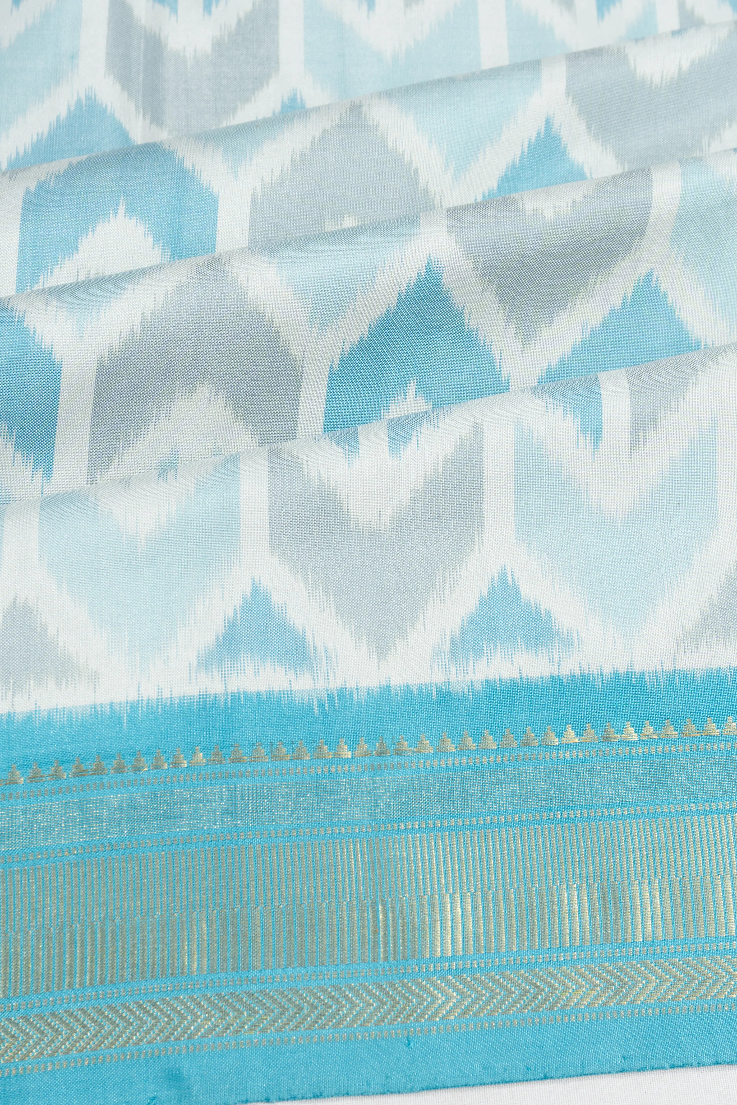 Pochampally Silk Ikat White And Blue Saree