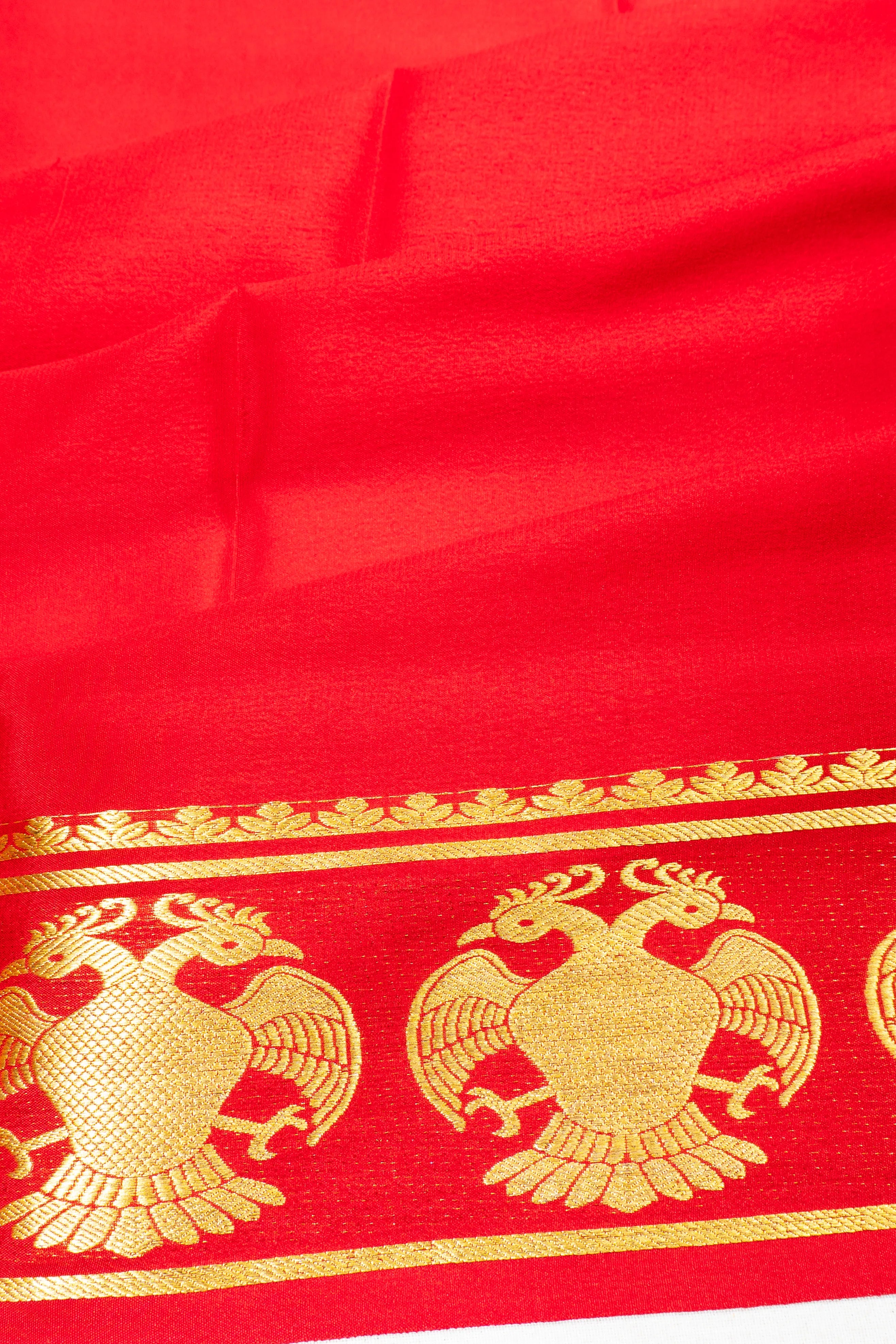 Binny Silk Plain Red Saree With Gandabherunda Border