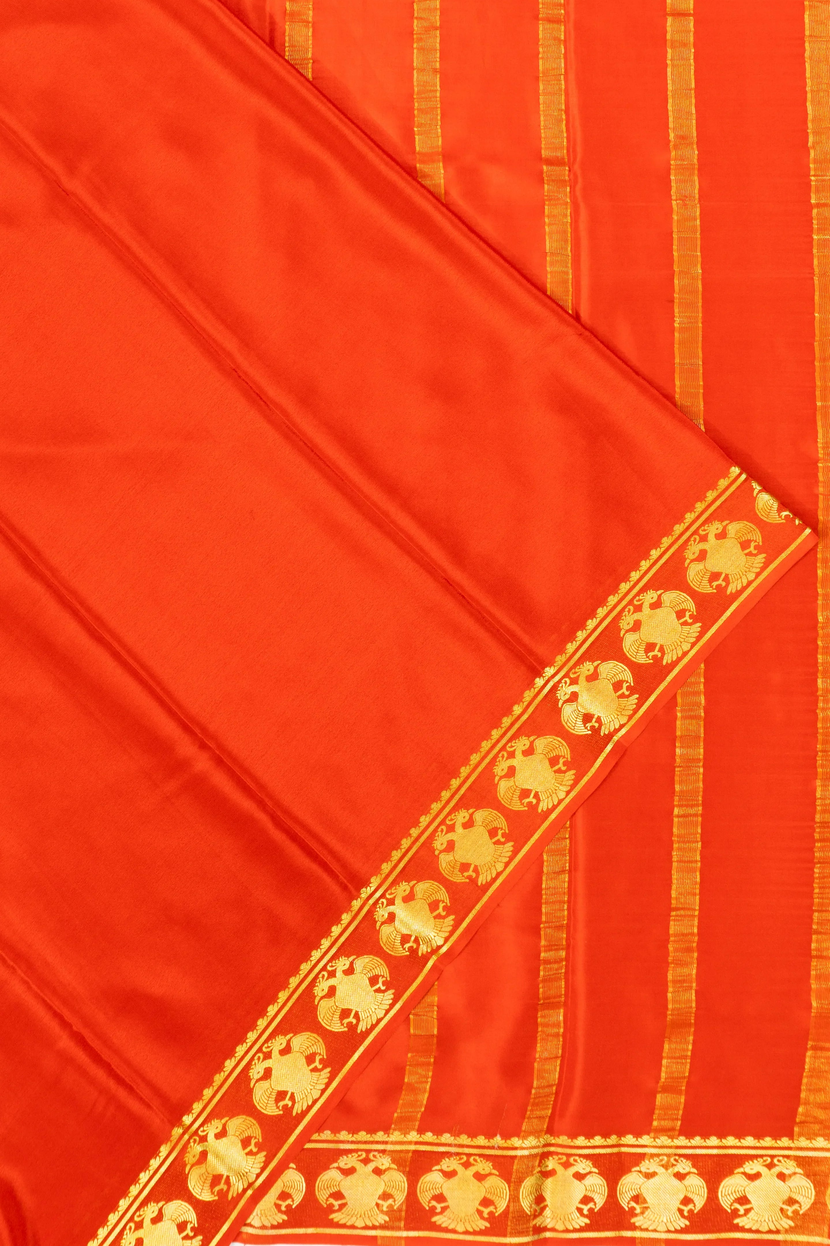 Binny Silk Plain Orange Saree With Gandabherunda Border