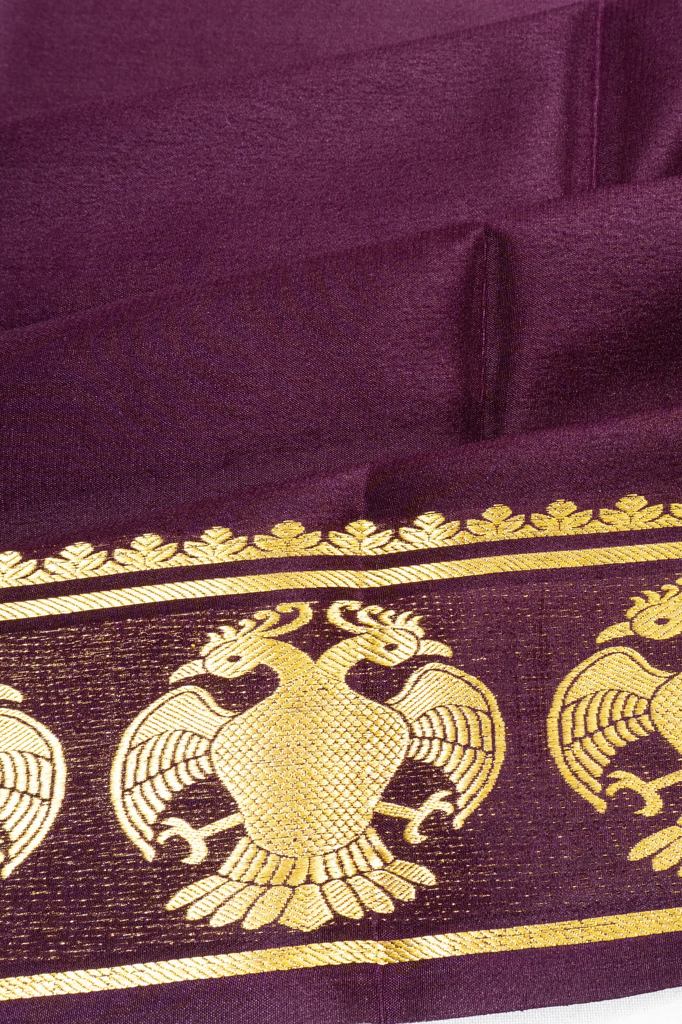 Binny Silk Plain Violet Saree With Gandabherunda Border