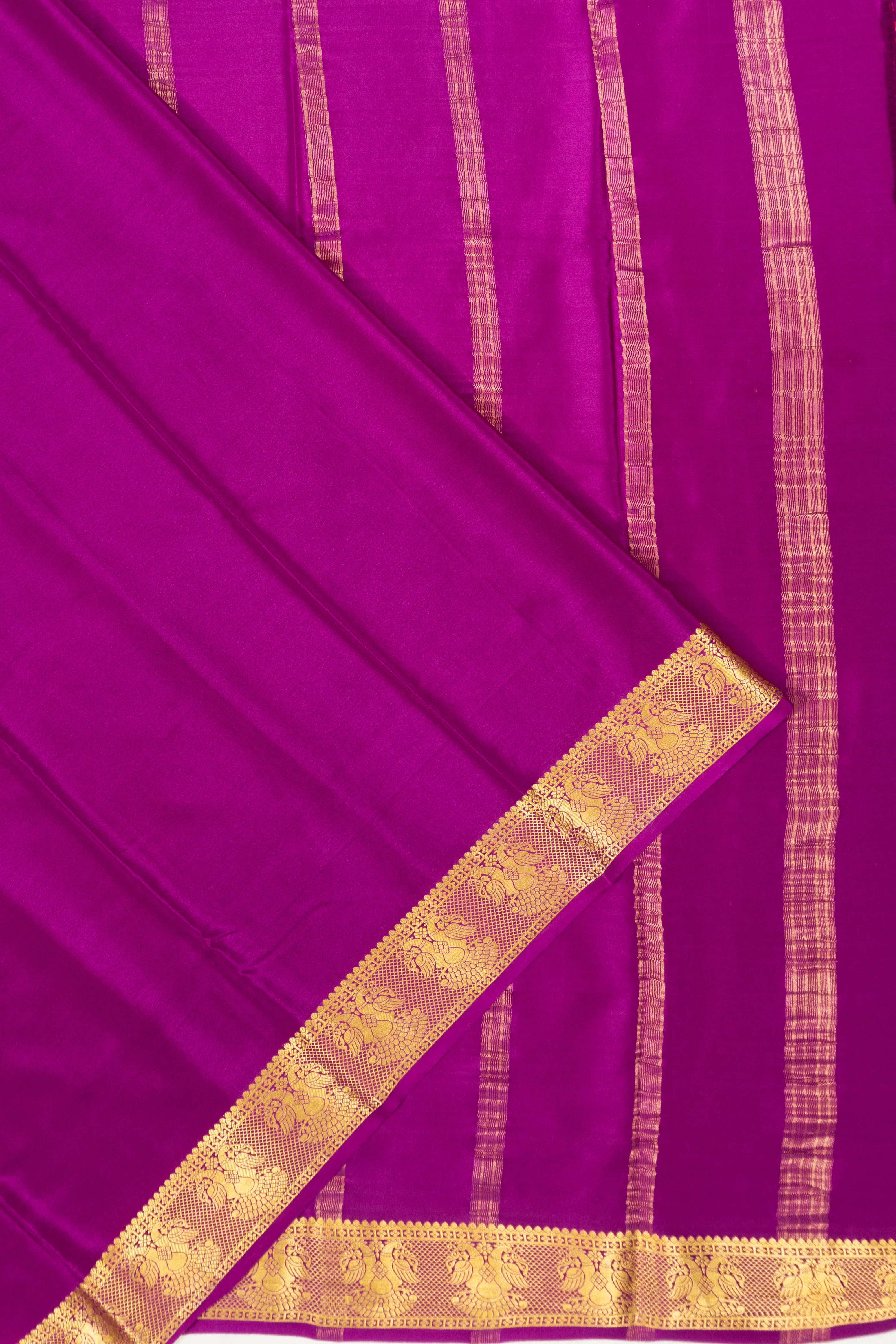 Binny Silk Plain Purple Saree With Gandabherunda Border