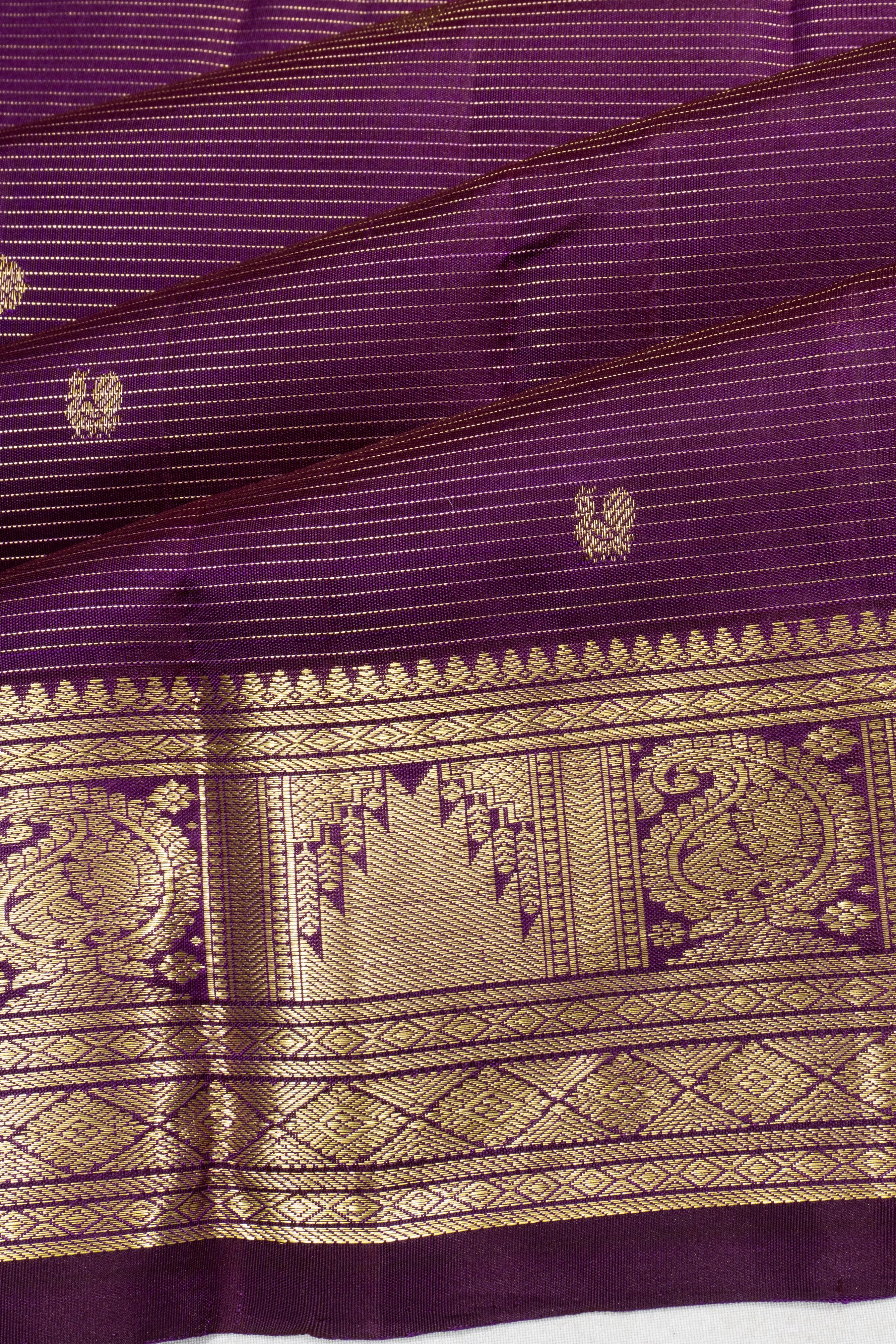 Kanchipuram Silk Oosi Lines And Butta Purple Saree