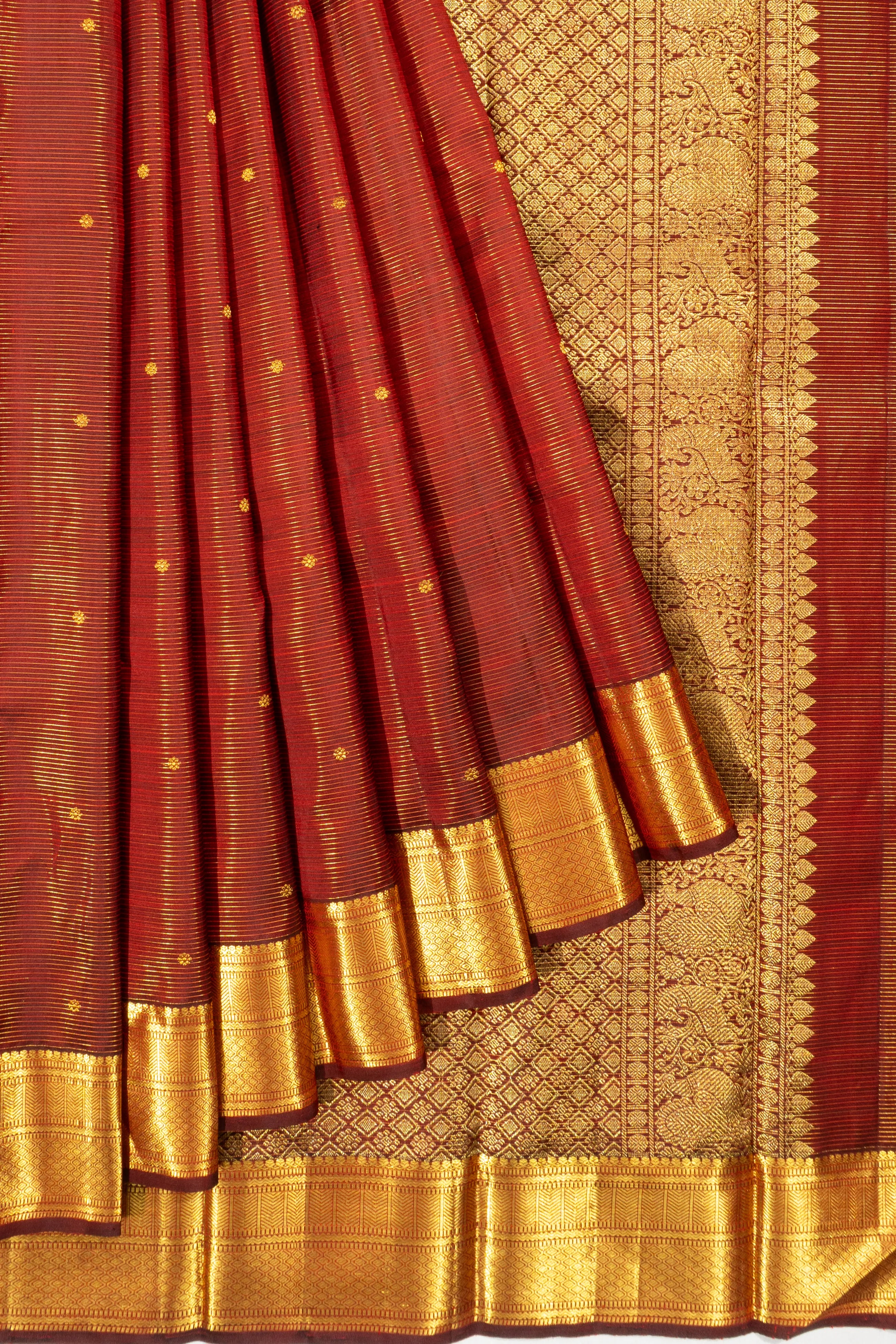 Kanchipuram Silk Oosi Lines And Butta Maroon Saree