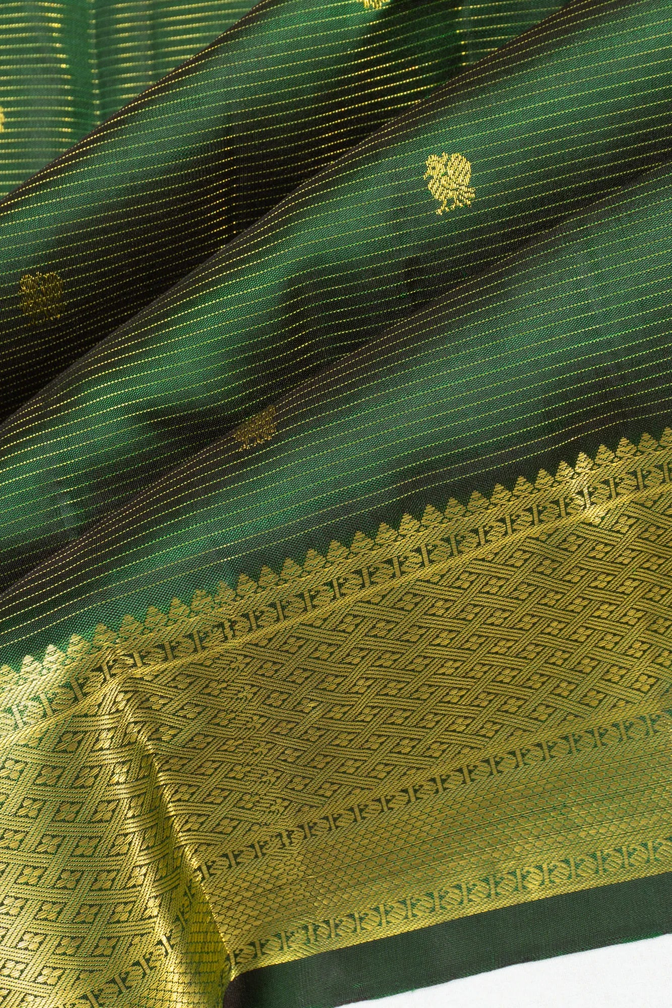 Kanchipuram Silk Oosi Lines And Butta Dark Green Saree