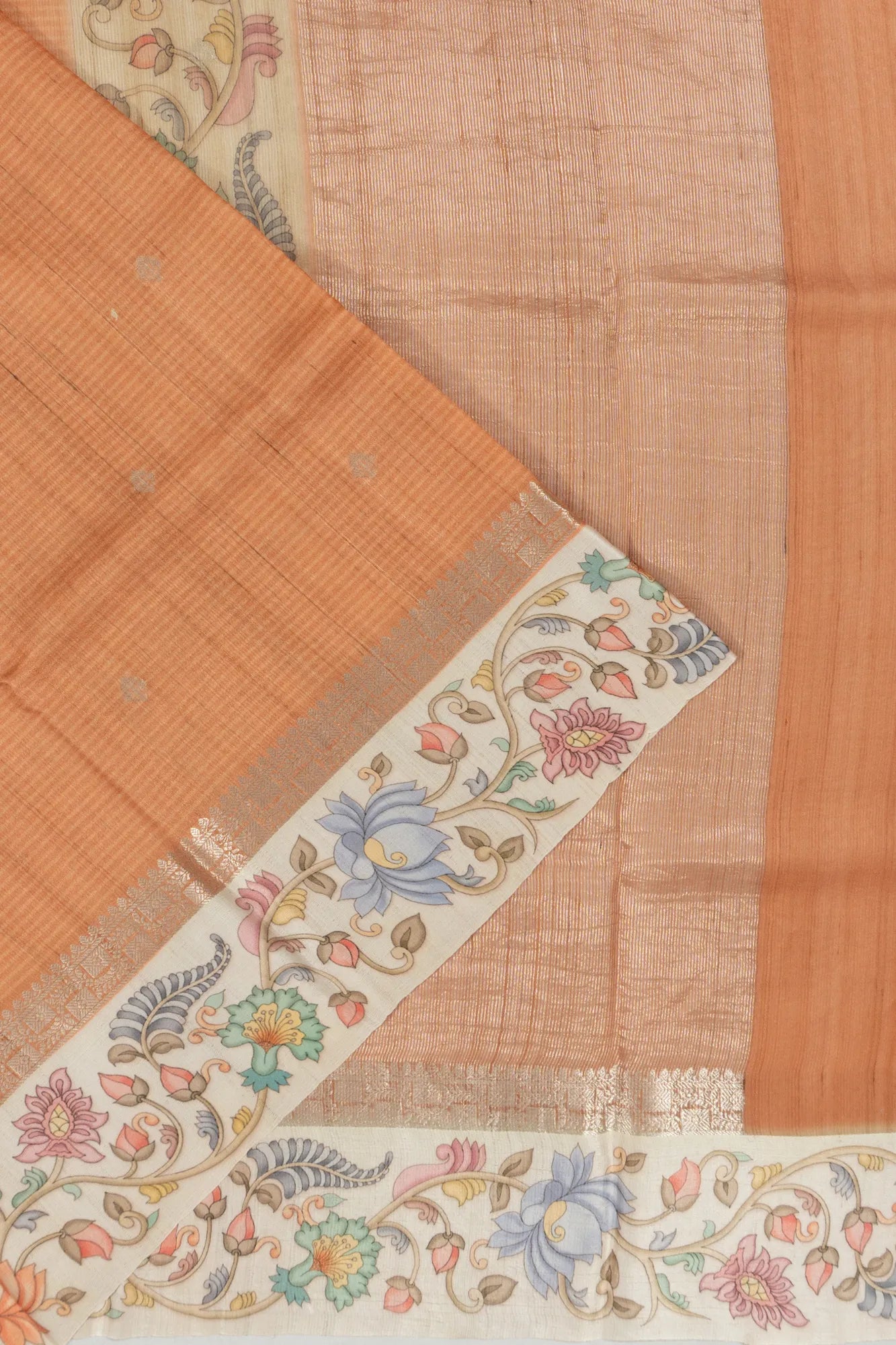 Tussar Lines And Butta Pastel Orange Saree With Printed Border