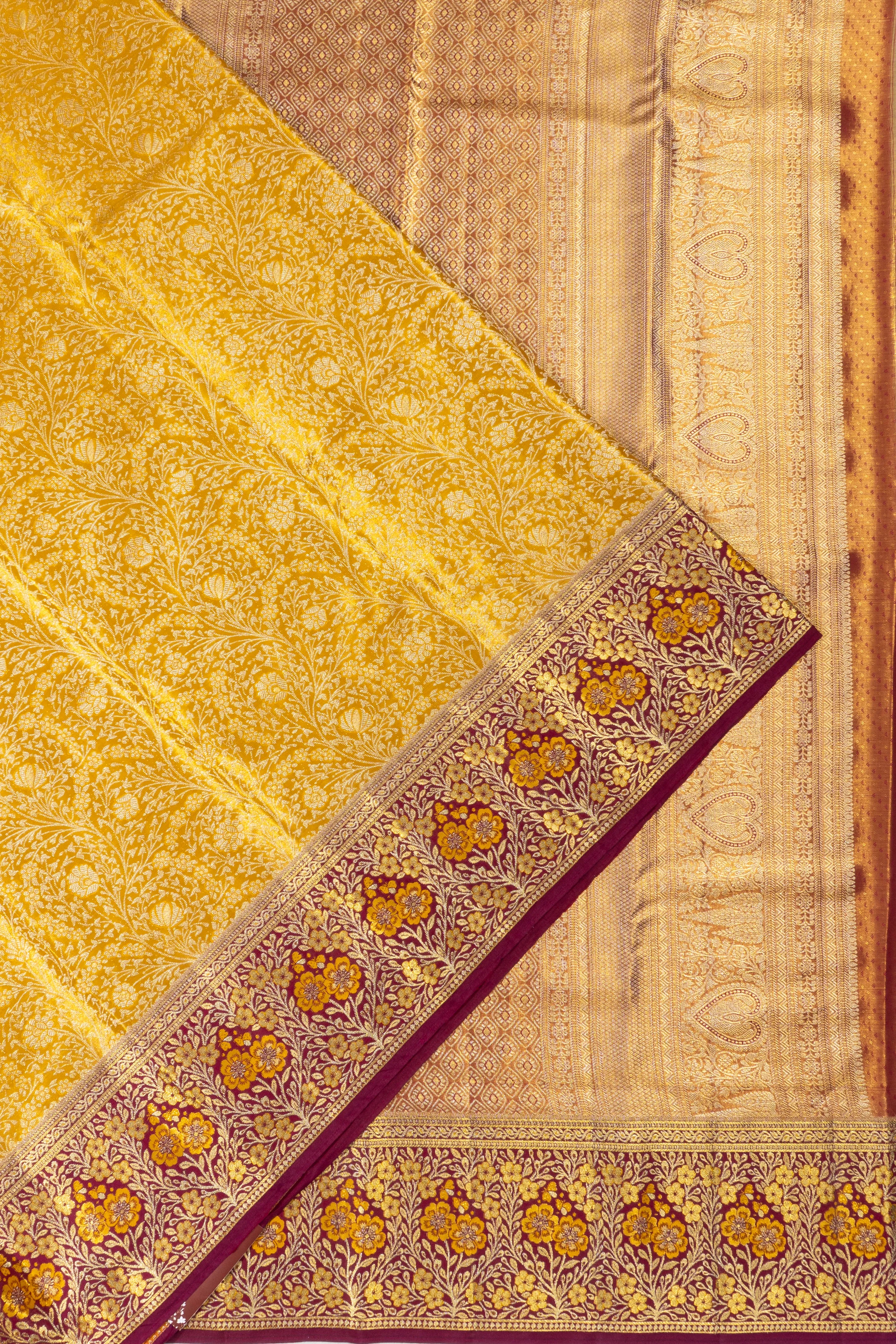 Taranga Kanchi Silk Tissue Brocade Gold Saree