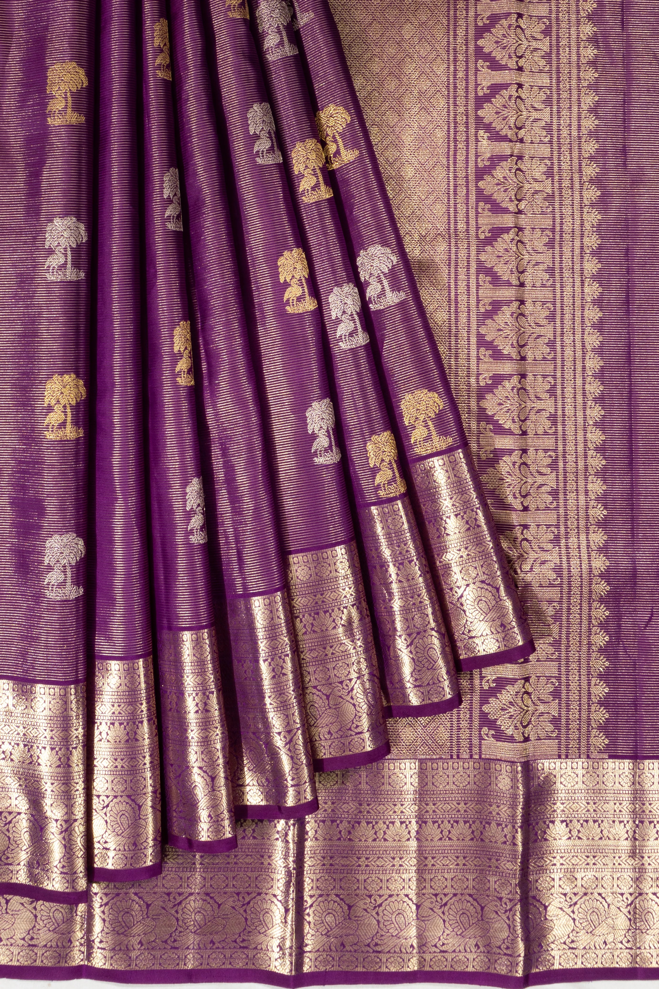 Kanchipuram Silk Oosi Lines And Butta Purple Saree