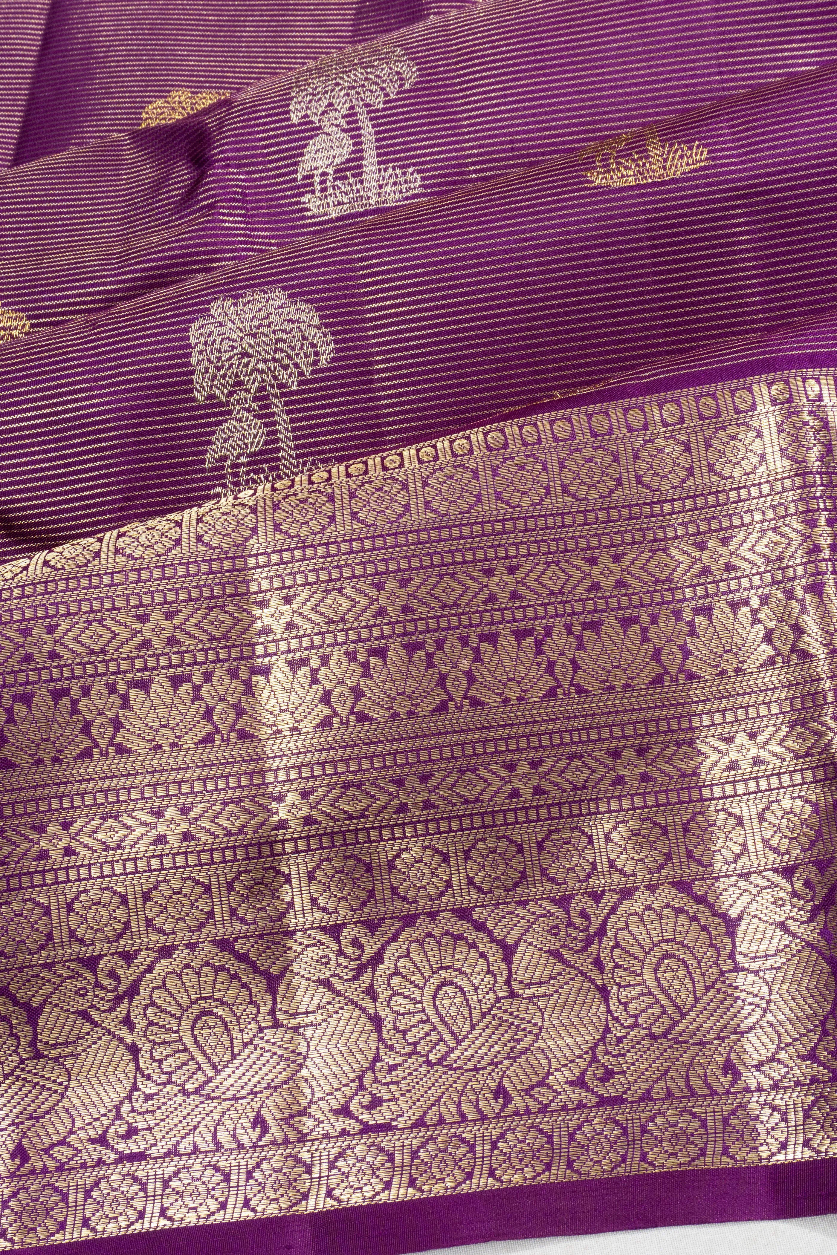 Kanchipuram Silk Oosi Lines And Butta Purple Saree