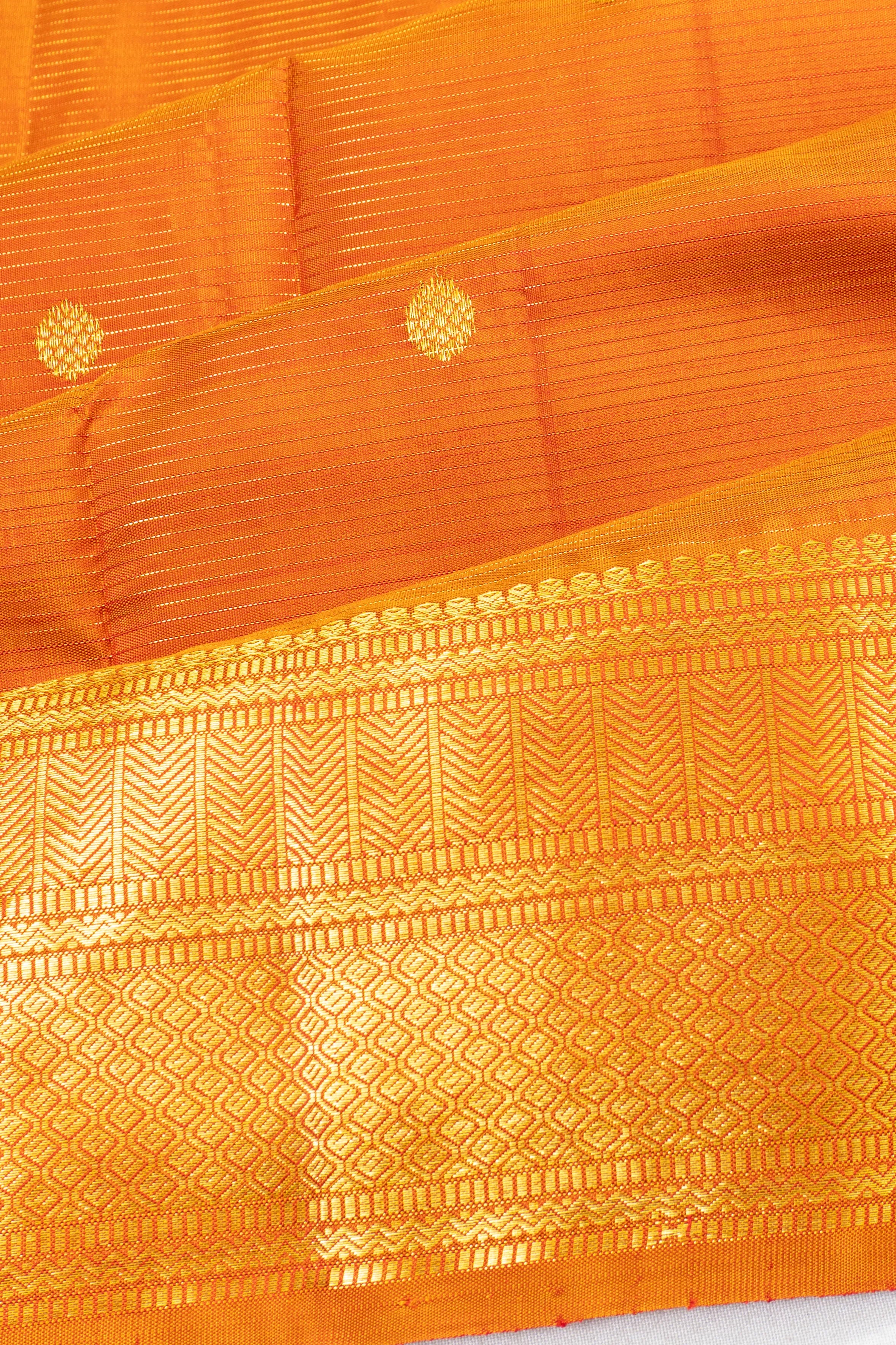Taranga Kanchi Silk Oosi Lines And Butta Orange Saree