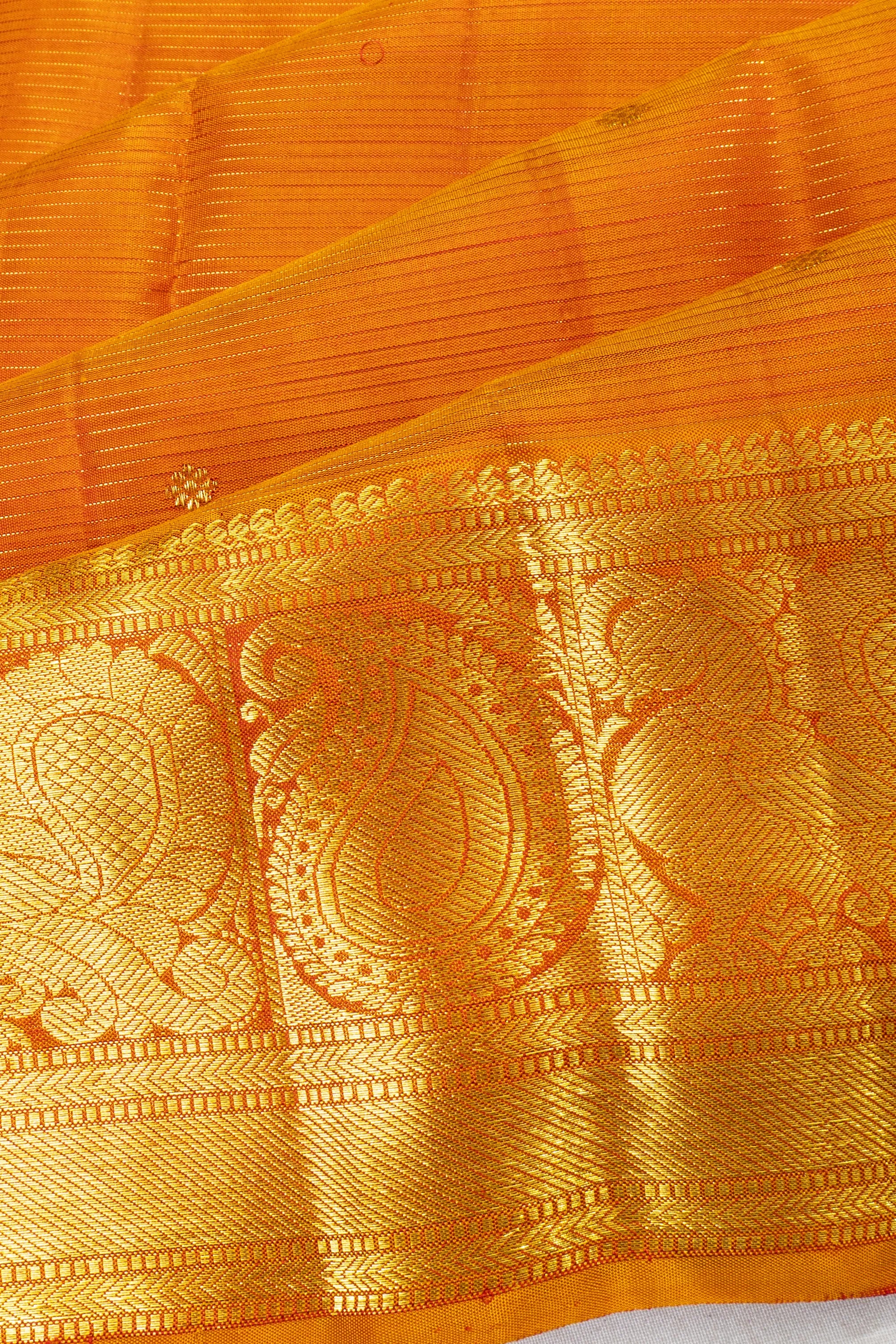Taranga Kanchi Silk Oosi Lines And Butta Orange Saree