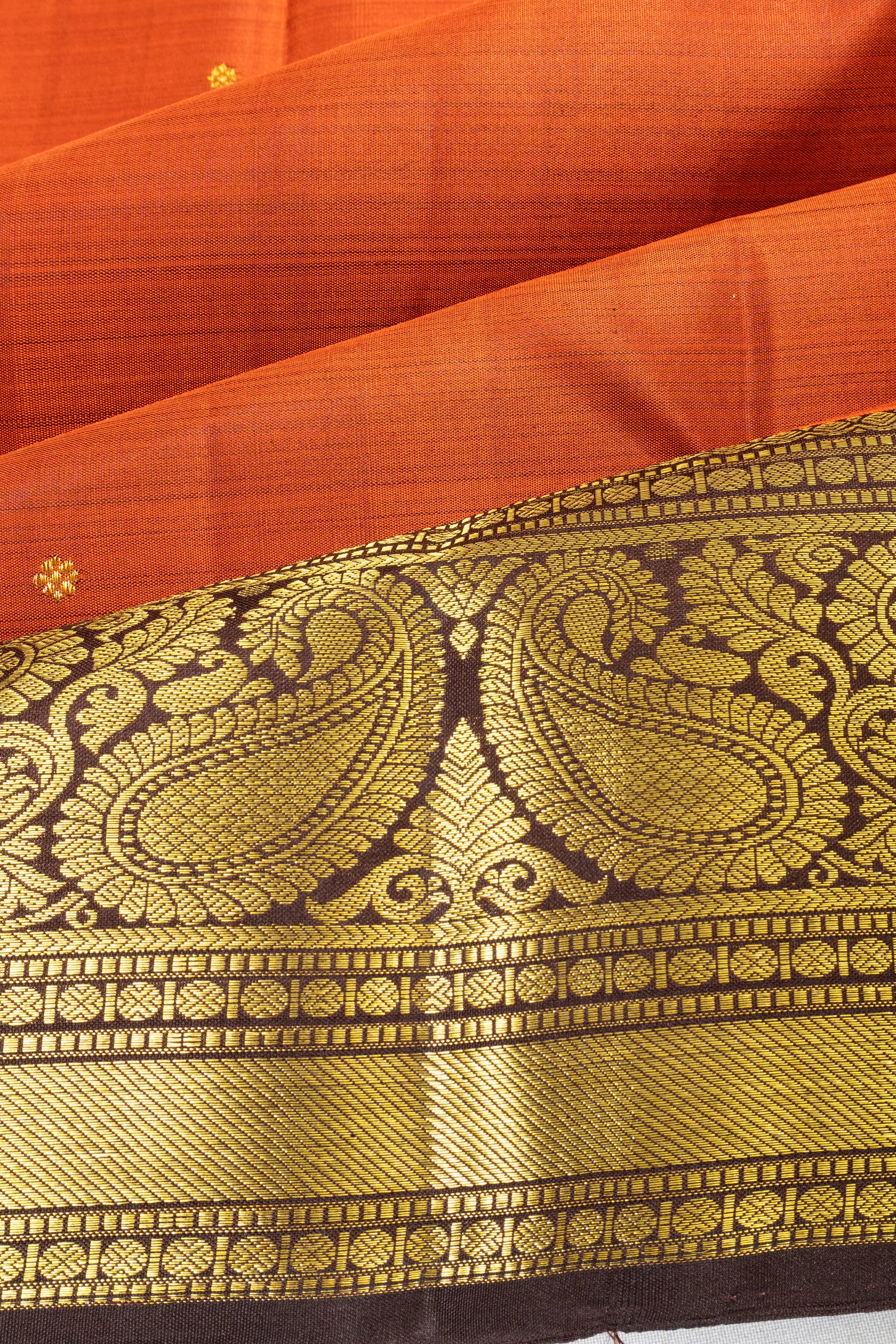 Taranga Kanchi Silk Butta Rust Orange Saree