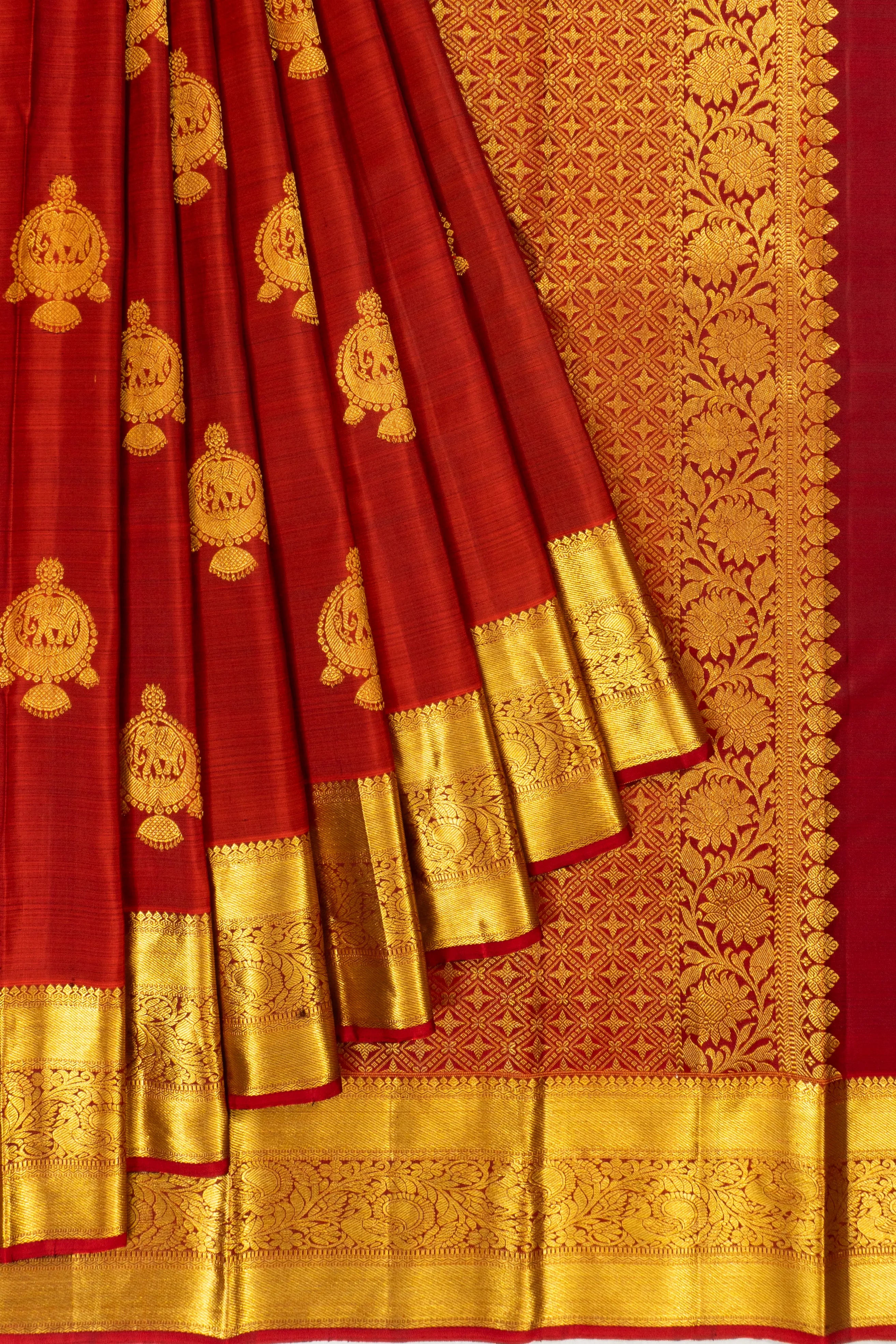 Taranga Kanchi Silk Butta Rust Orange Saree