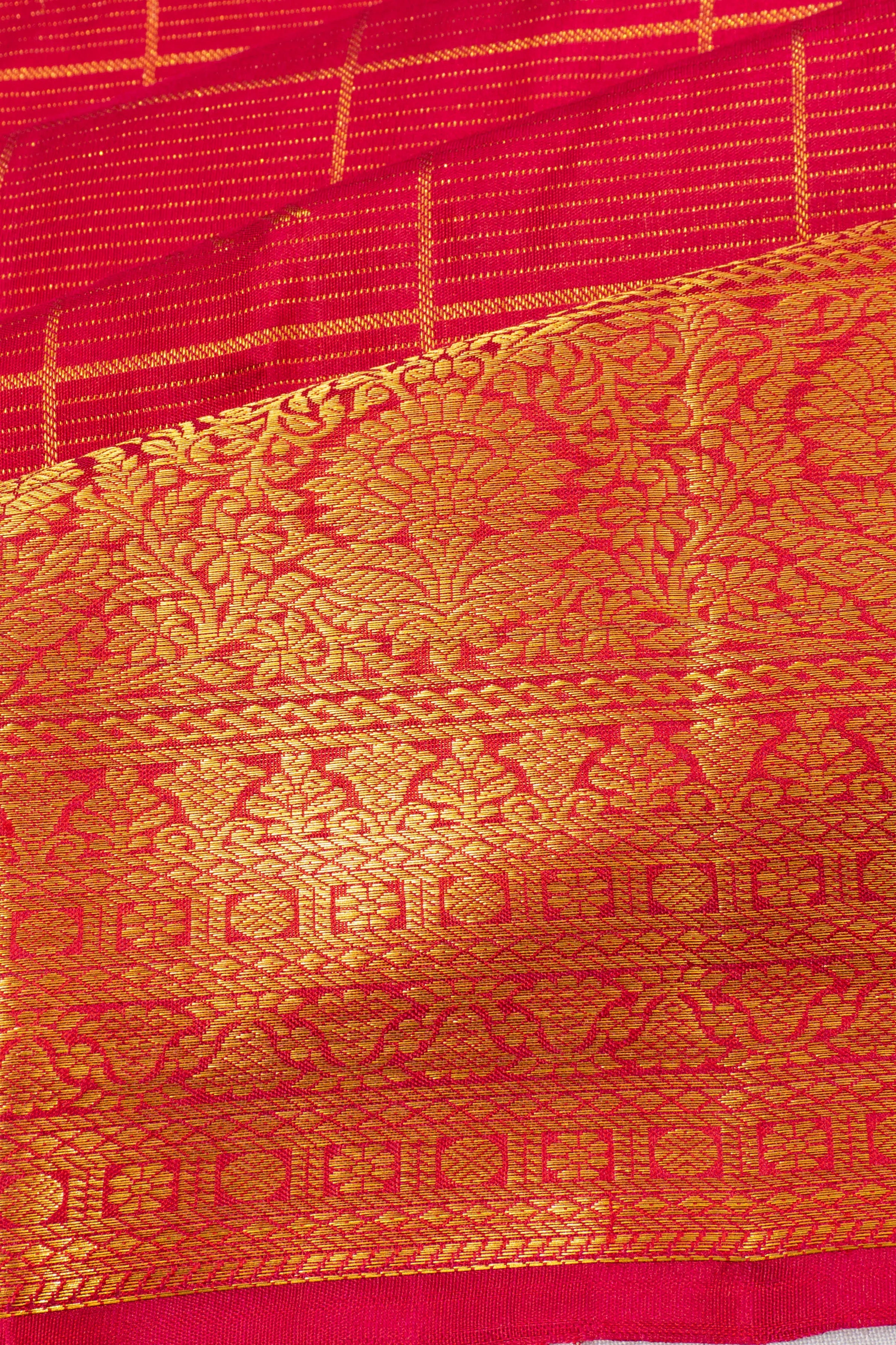 Taranga Kanchi Silk Checks And Butta Red Saree