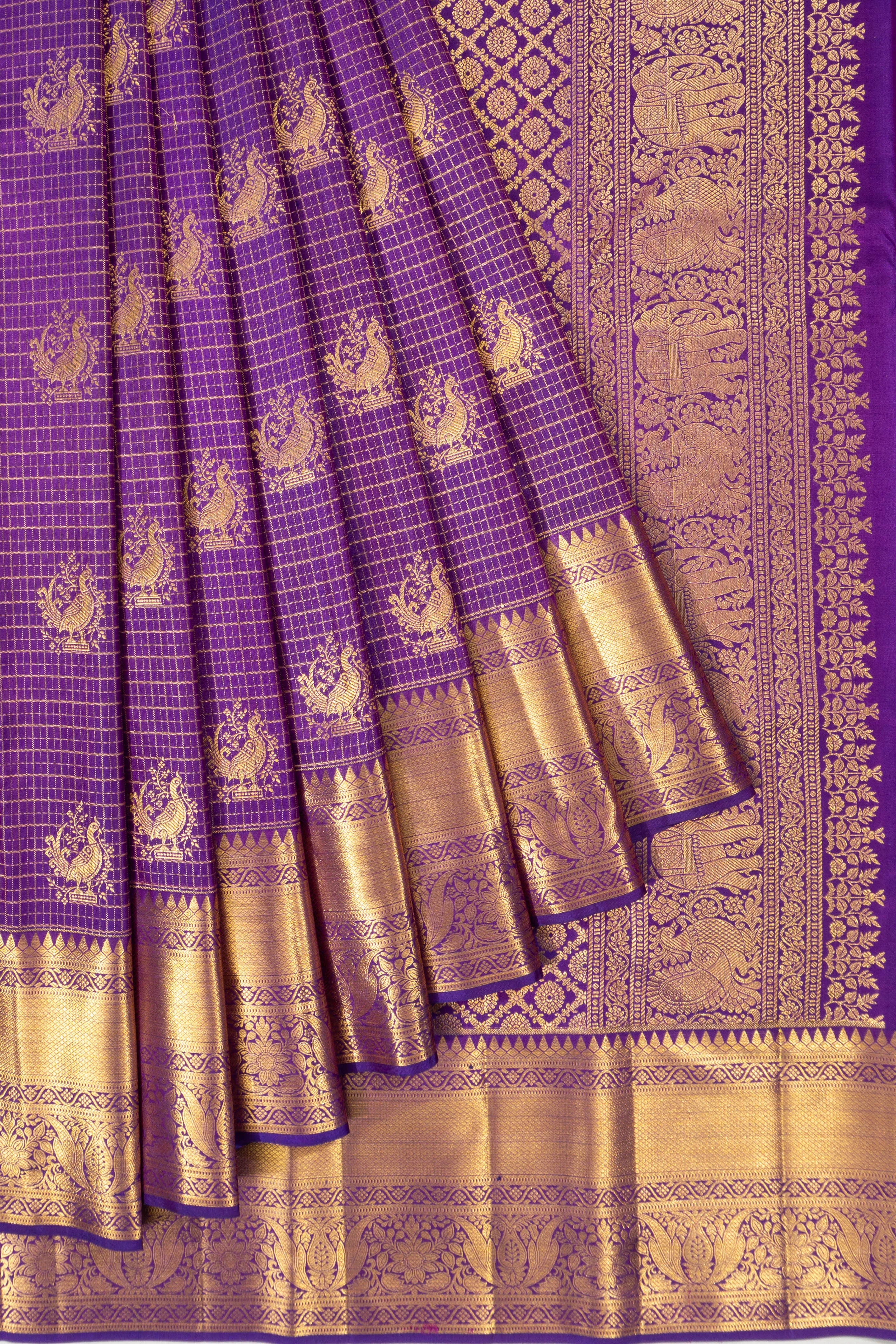 Taranga Kanchi Silk Checks And Butta Purple Saree