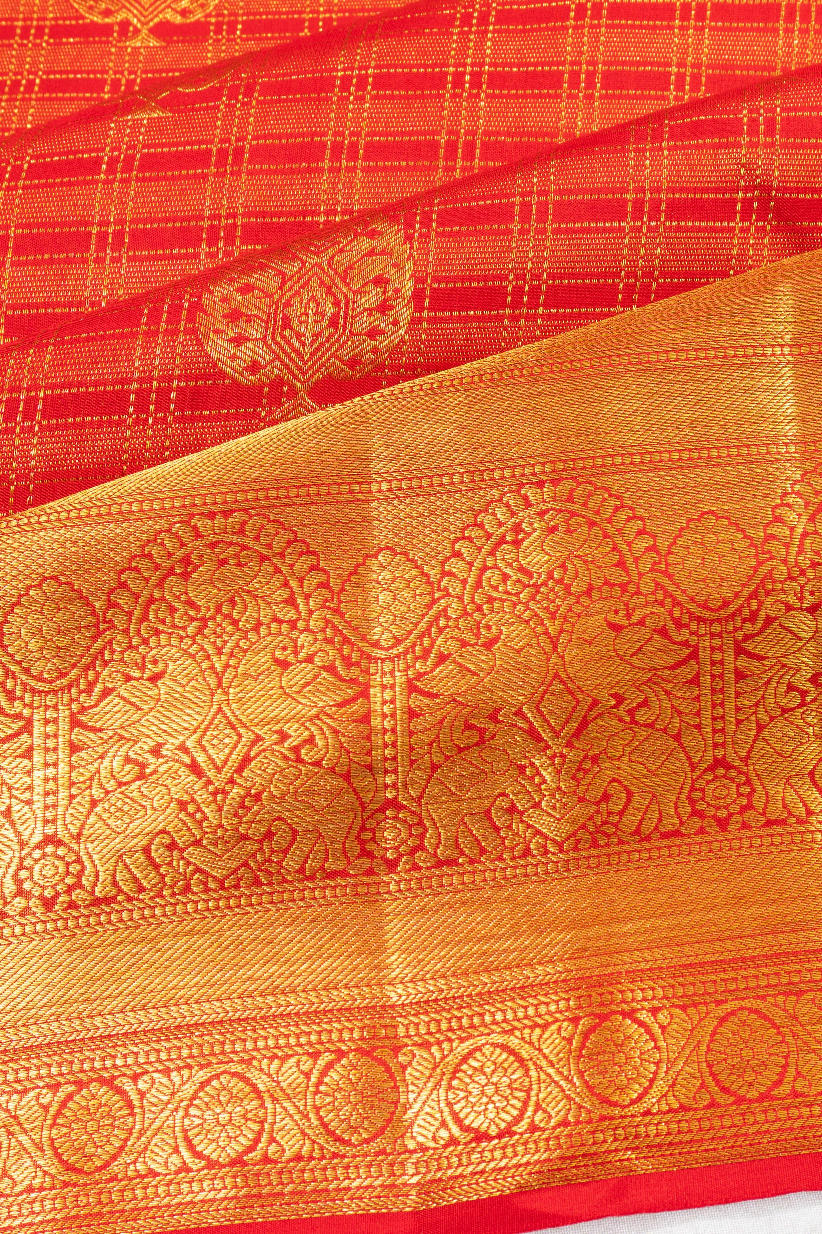 Taranga Kanchi Silk Checks And Butta Red Saree