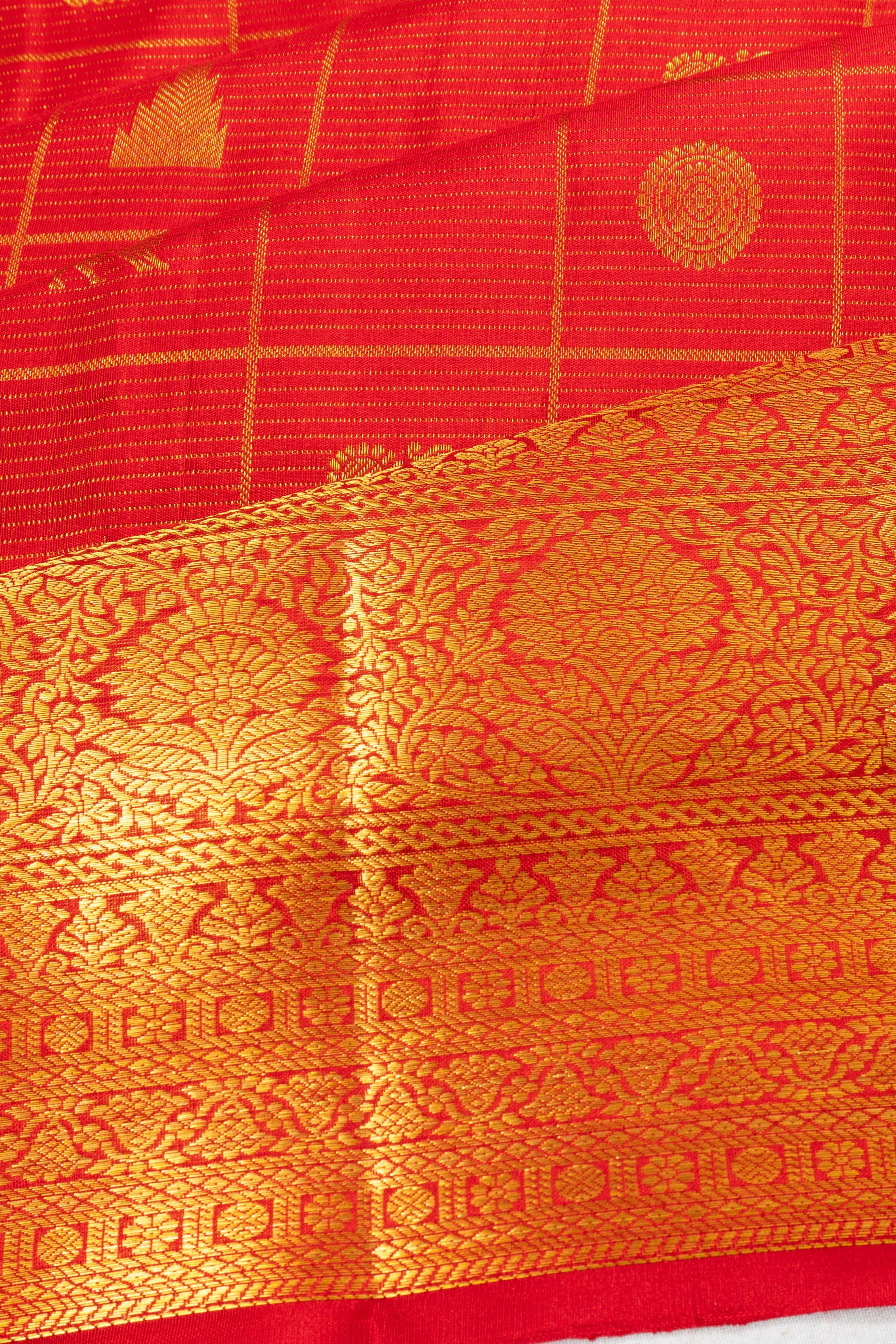 Taranga Kanchi Silk Checks And Butta Red Saree