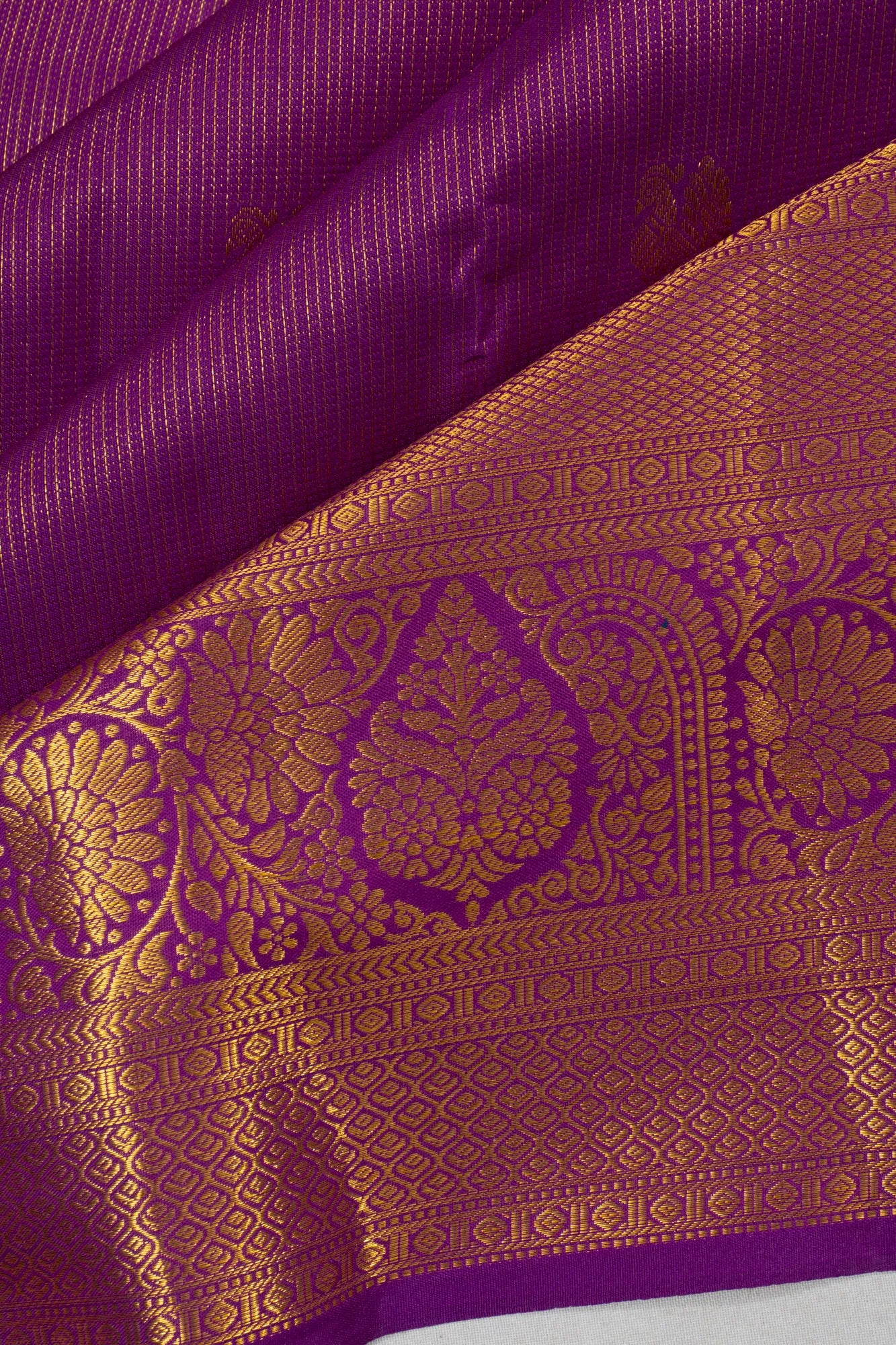 Taranga Kanchi Silk Checks And Butta Purple saree