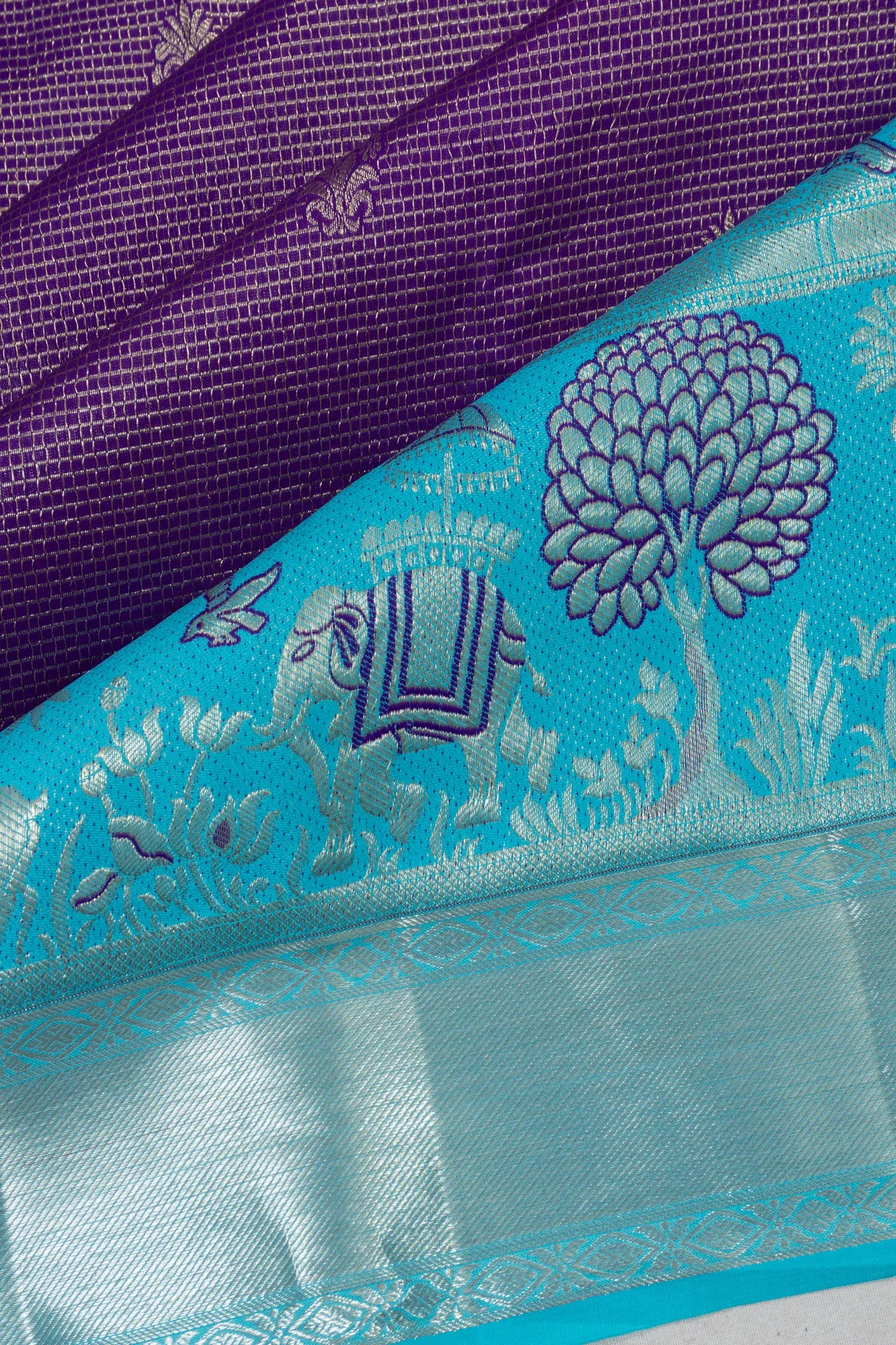 Taranga Kanchi Silk Checks And Butta Purple Saree