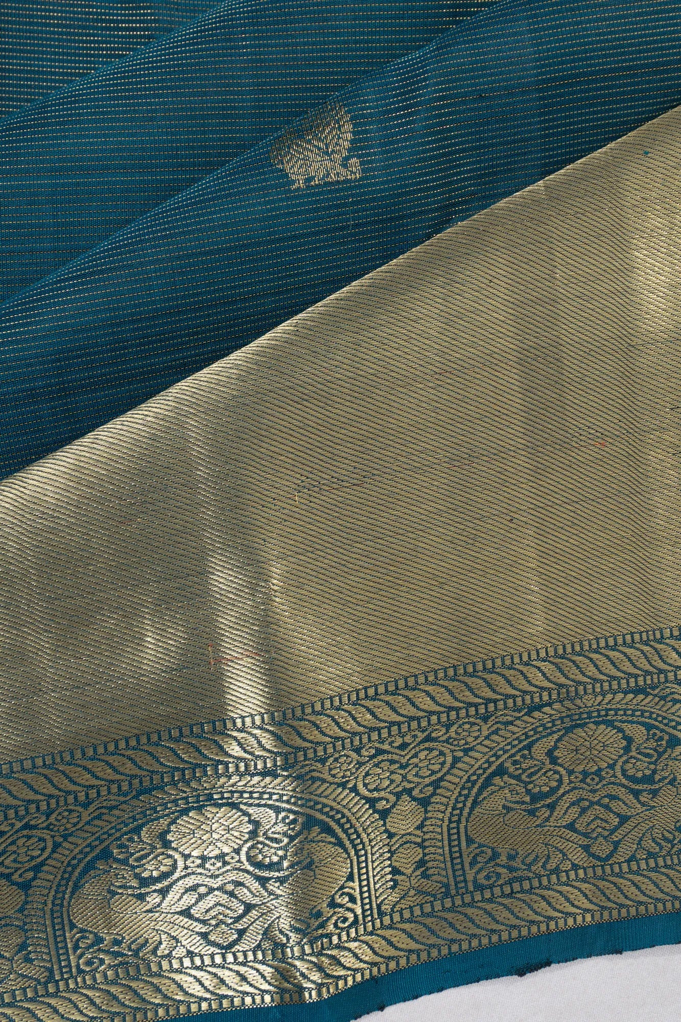 Kanchipuram Silk Oosi Lines And Butta Teal Blue Saree