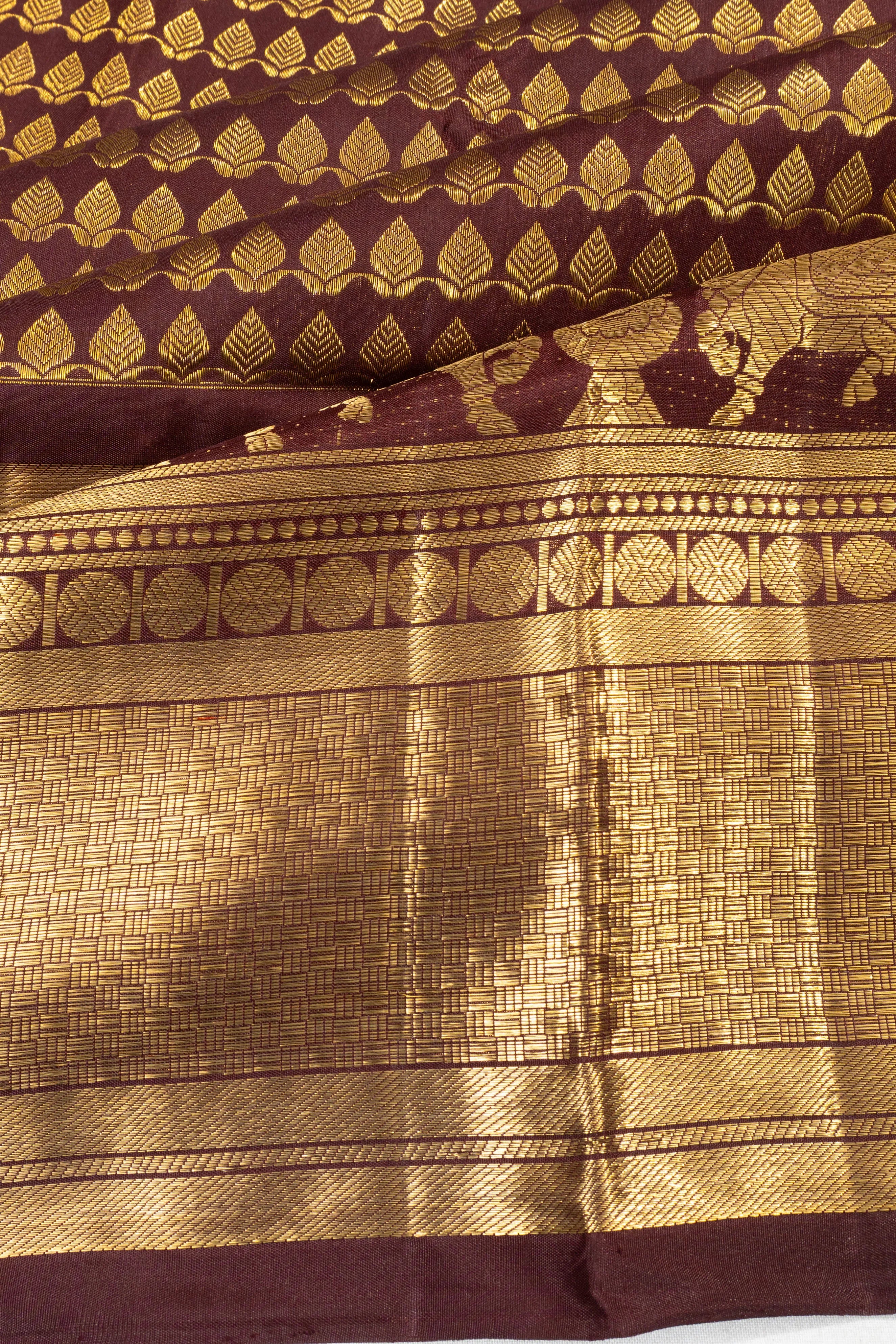 Kanchipuram Silk Brocade Brown Saree With Pichwai Border