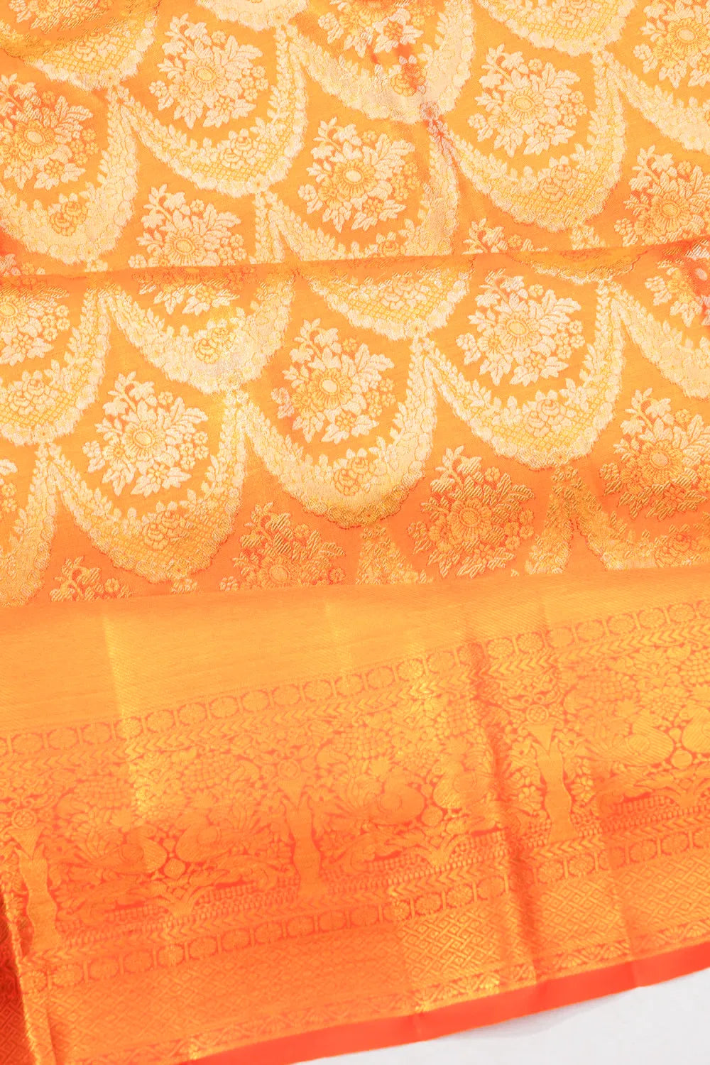 Taranga Kanchi Silk Tissue Brocade Orange Saree