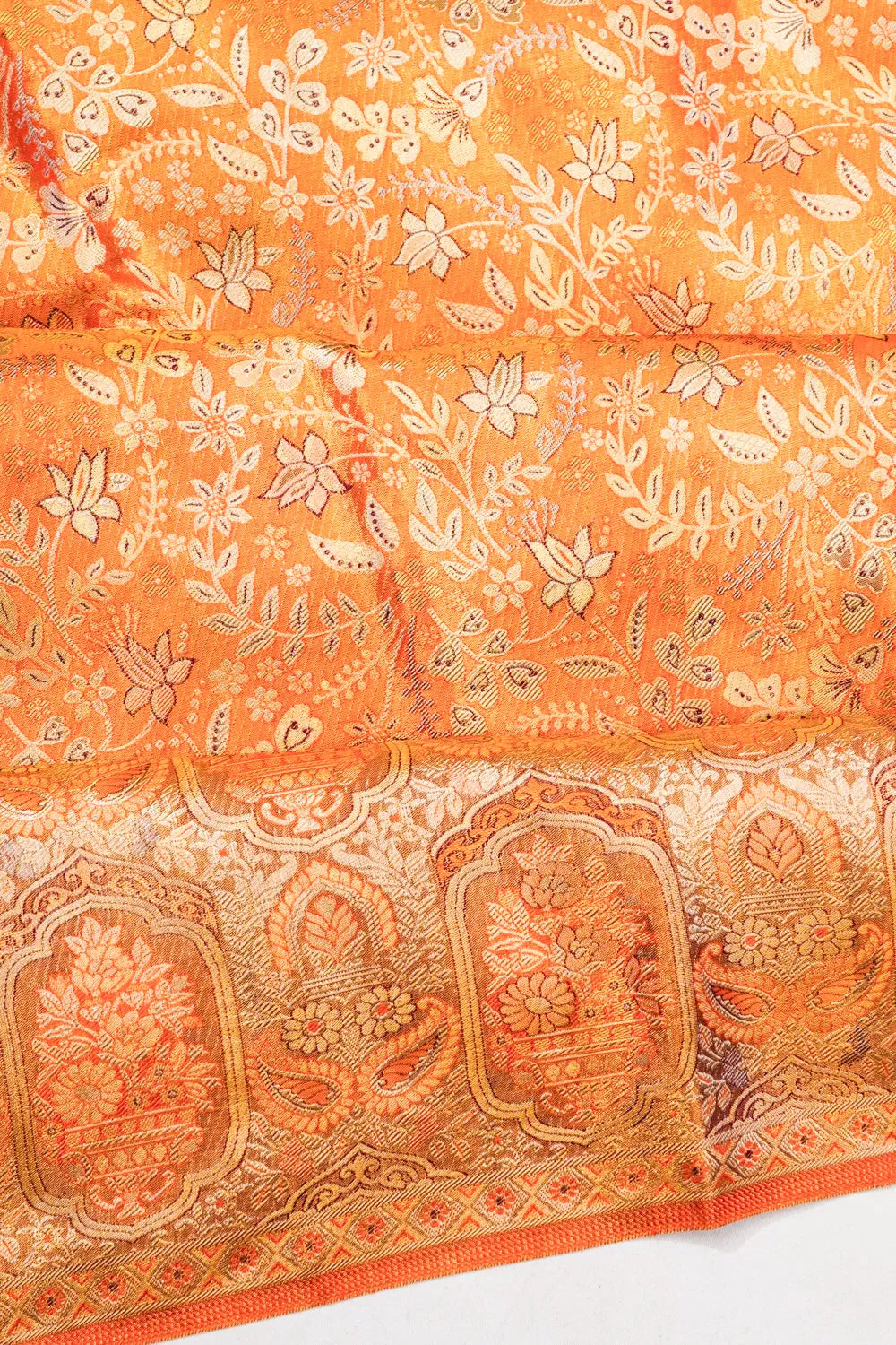 Taranga Kanchi Silk Tissue Brocade Orange Saree