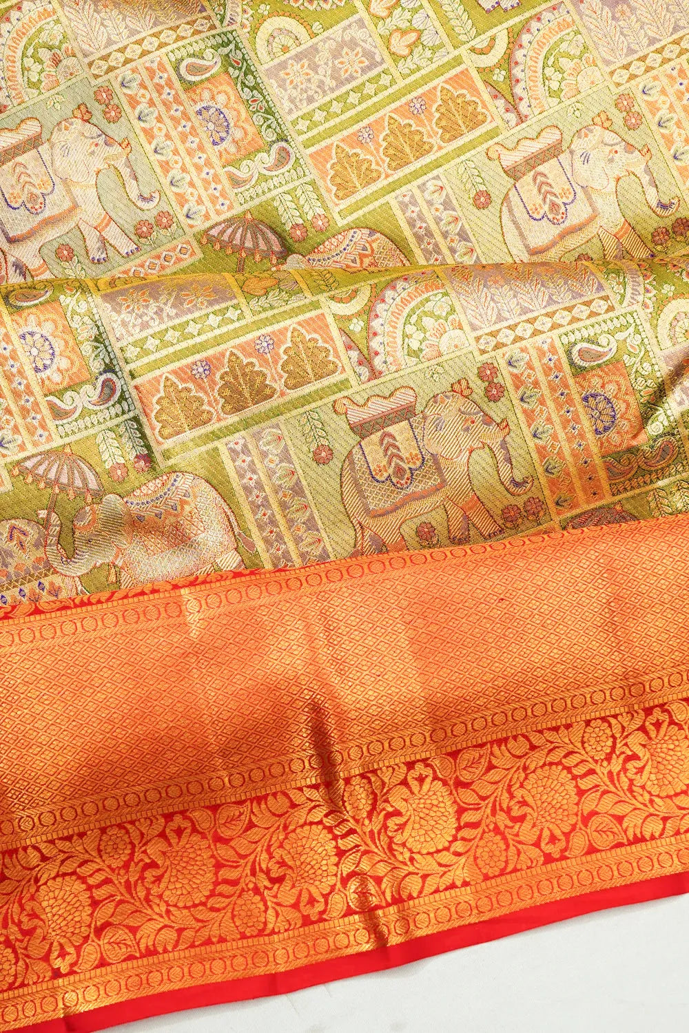 Taranga Kanchi Silk Tissue Brocade Green Saree