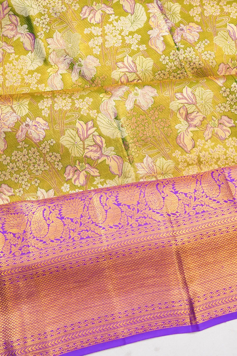 Taranga Kanchi Silk Tissue Brocade Green Saree