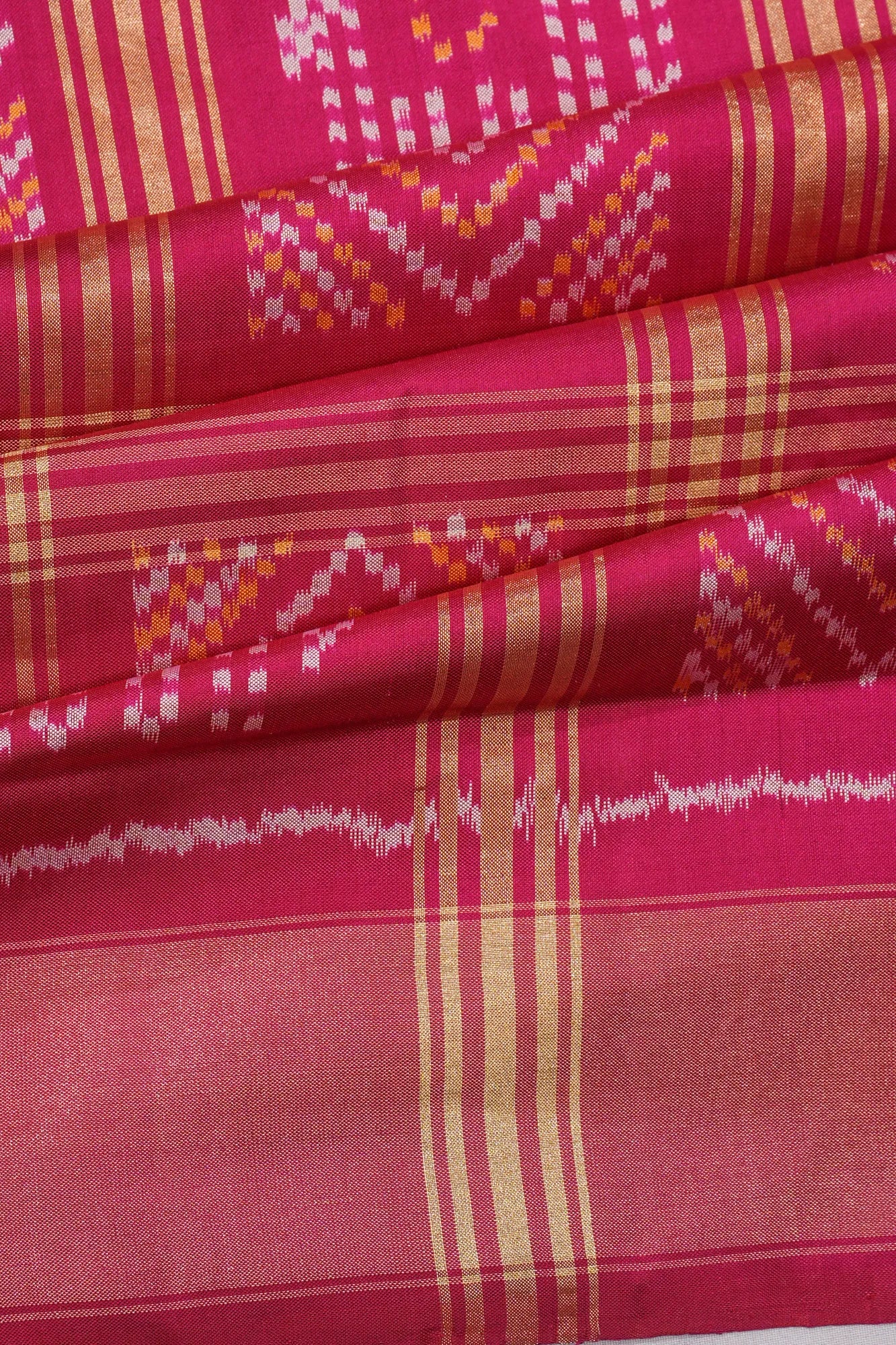 Pochampally Silk Ikat Checks Pink Saree With Pichwai Motifs