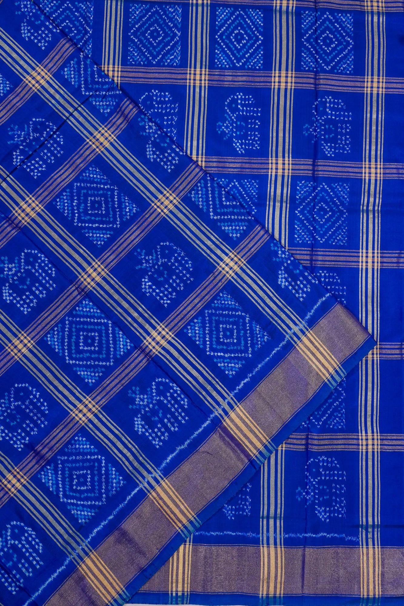 Pochampally Silk Ikat Checks Royal Blue Saree With Pichwai Motifs
