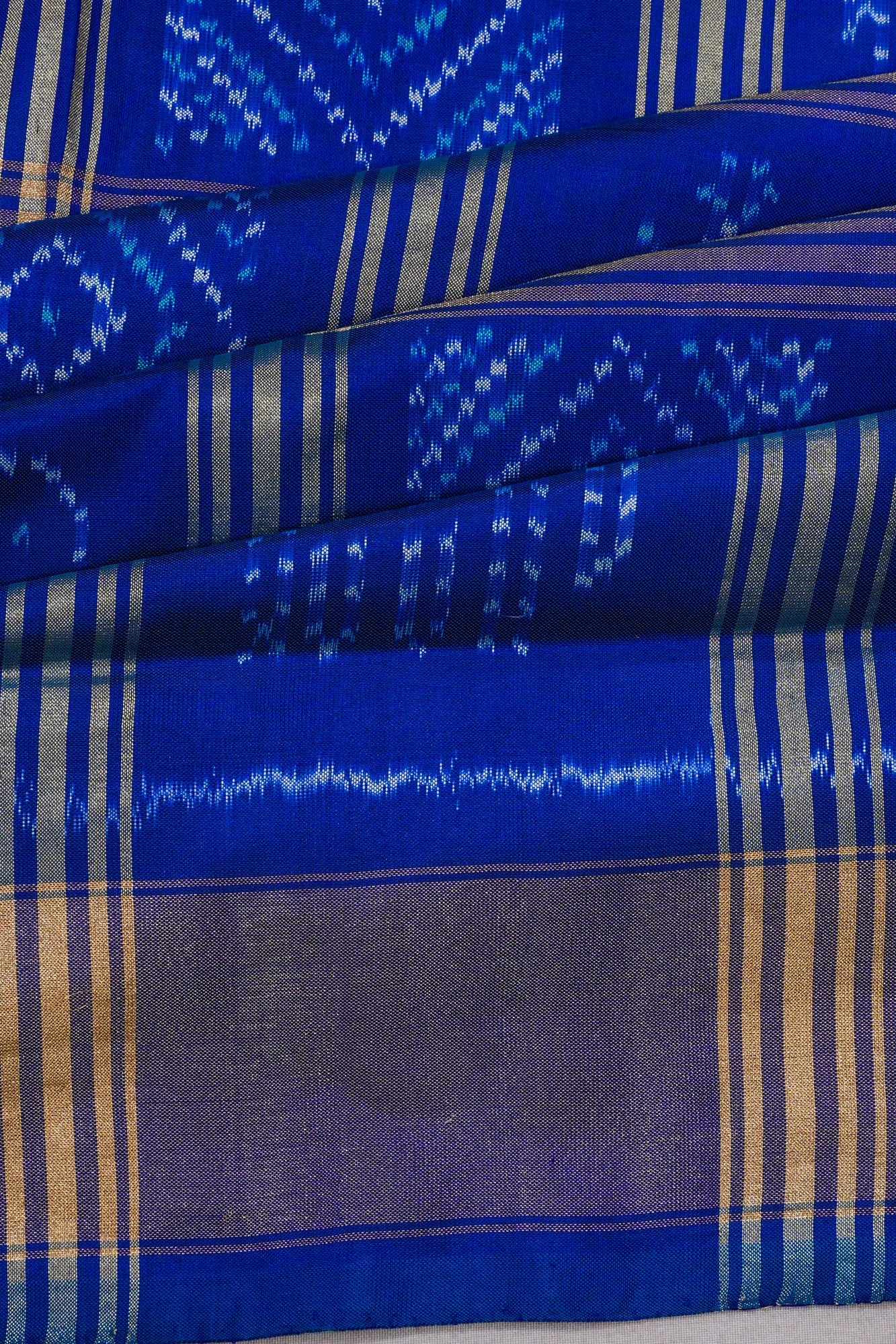 Pochampally Silk Ikat Checks Royal Blue Saree With Pichwai Motifs