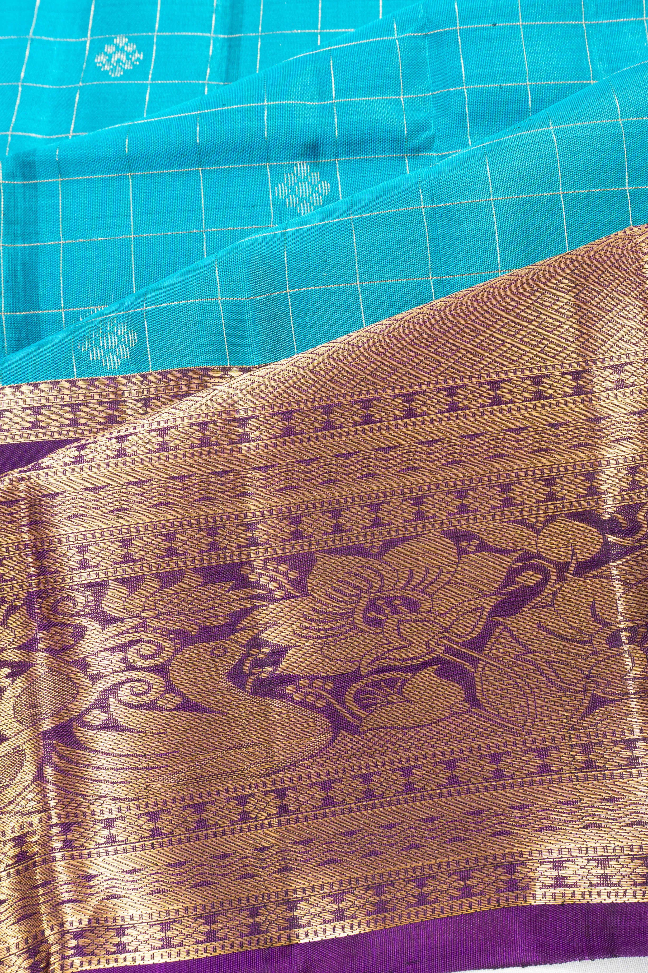 Taranga Kanchi Silk Checks And Butta Sky Blue Saree